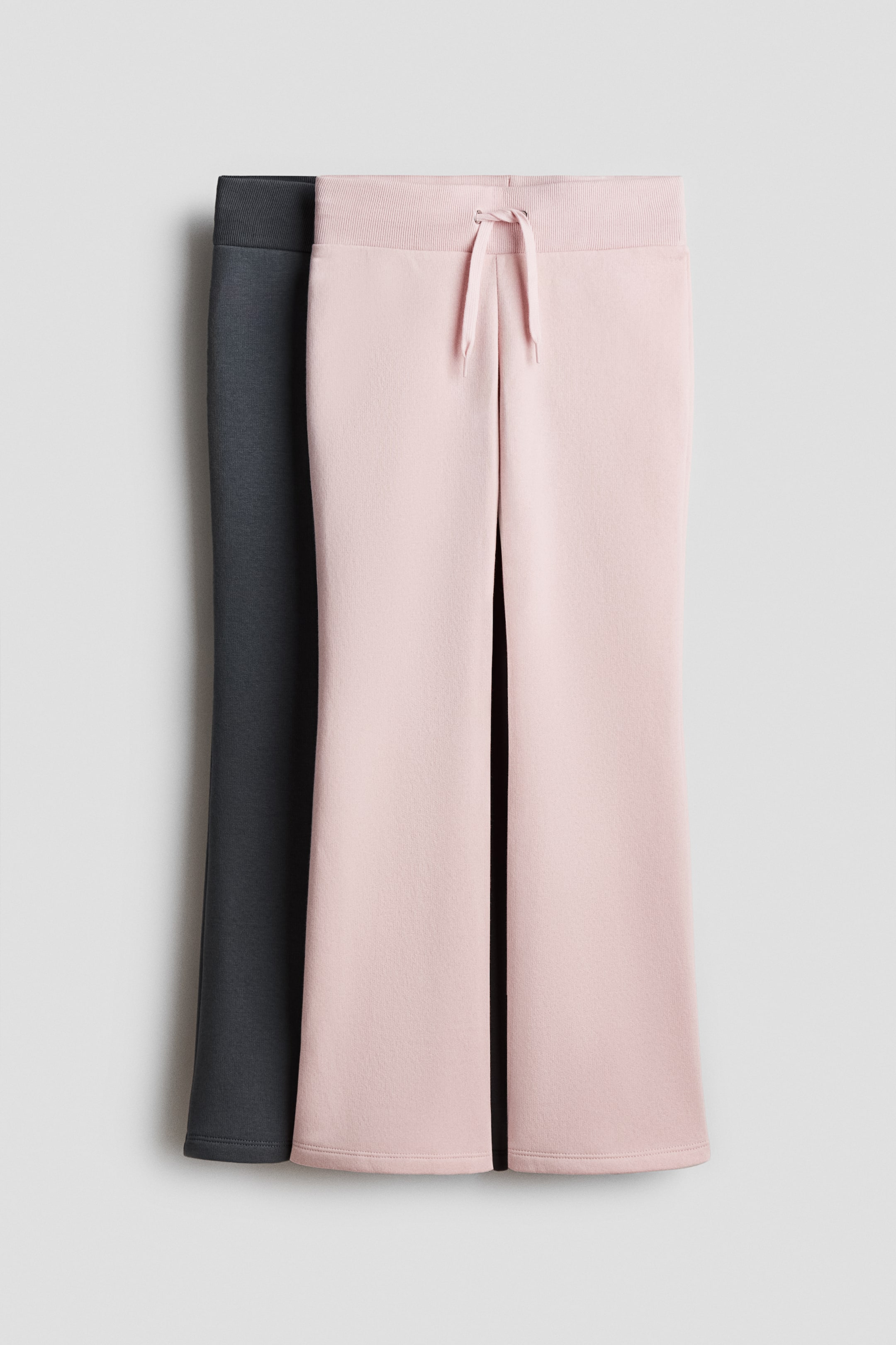 Zobacz większy obraz: Dresowe joggersy rozszerzane 2-pak - Jasnoróżowy/Ciemnoszary - Dziecko | H&M PL 1