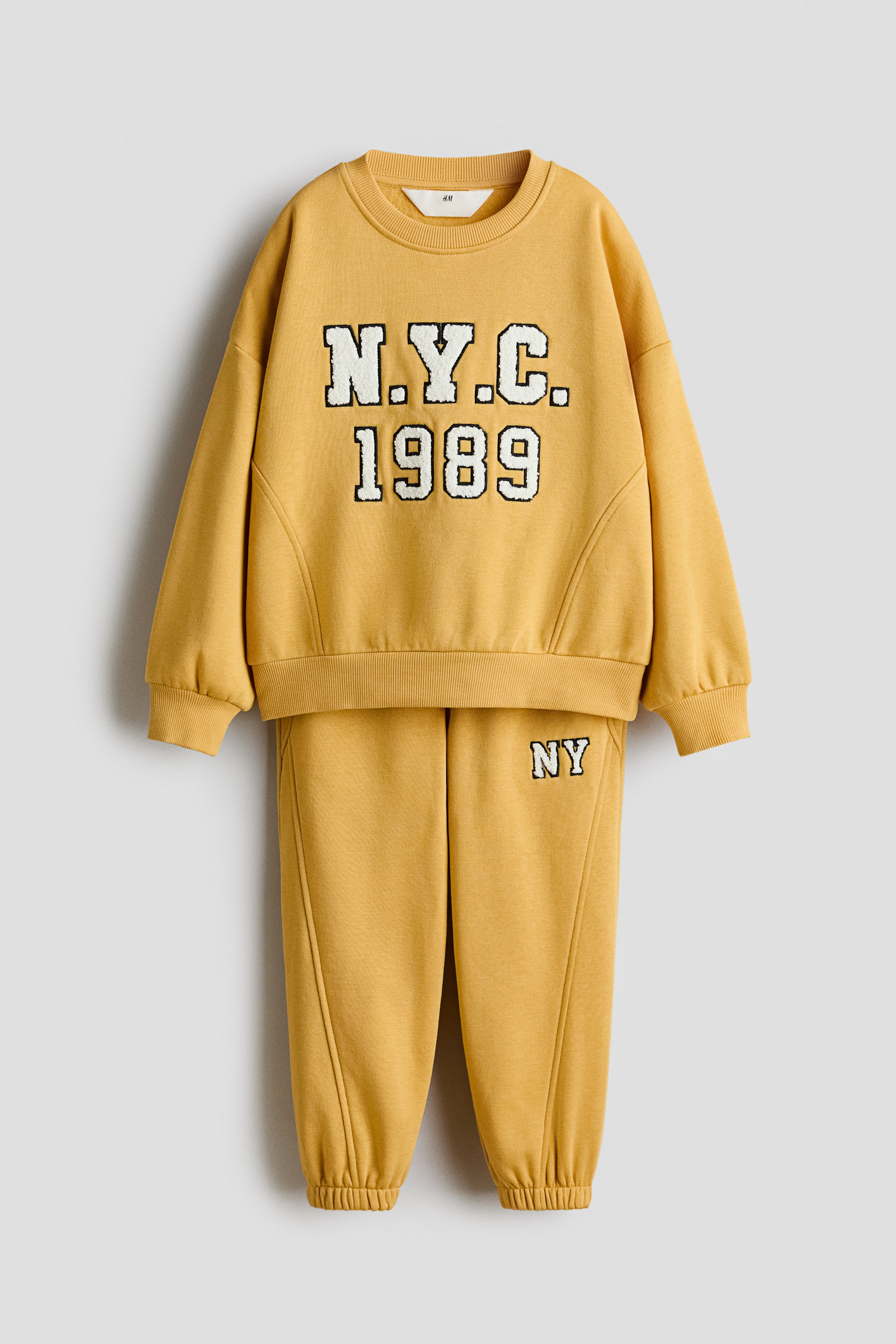 Größeres Bild ansehen: 2-teiliges Sweatshirt-Set - Senfgelb/NYC - Kids | H&M DE 1
