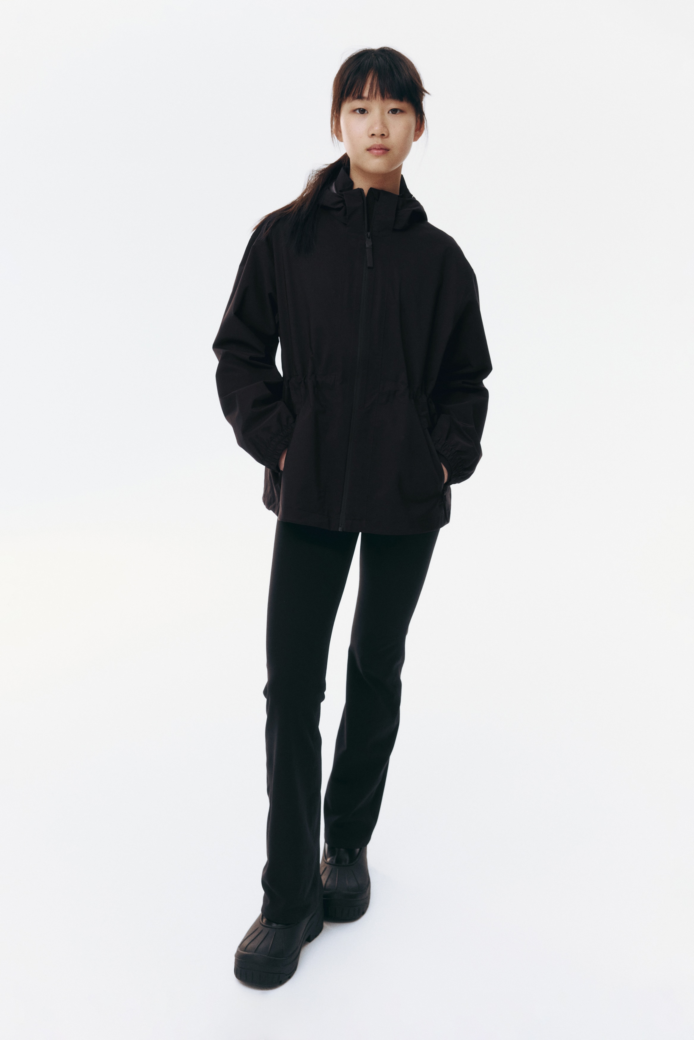 Regnjacka med StormMove™ - Svart/Vit/Khakigrön