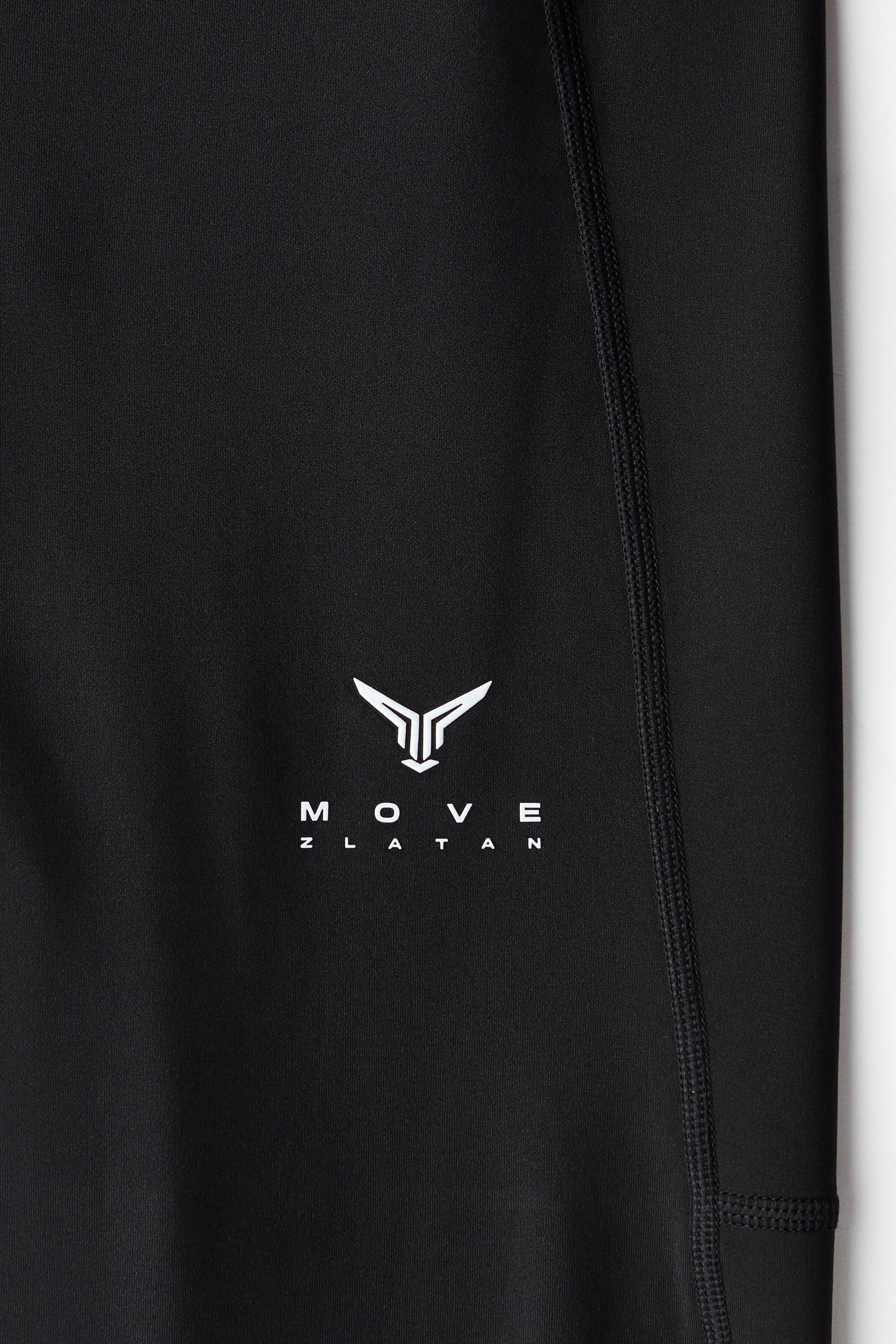 View larger image: Warming sports tights with ThermoMove™ - Black/Move Zlatan - Men | H&M IN 8