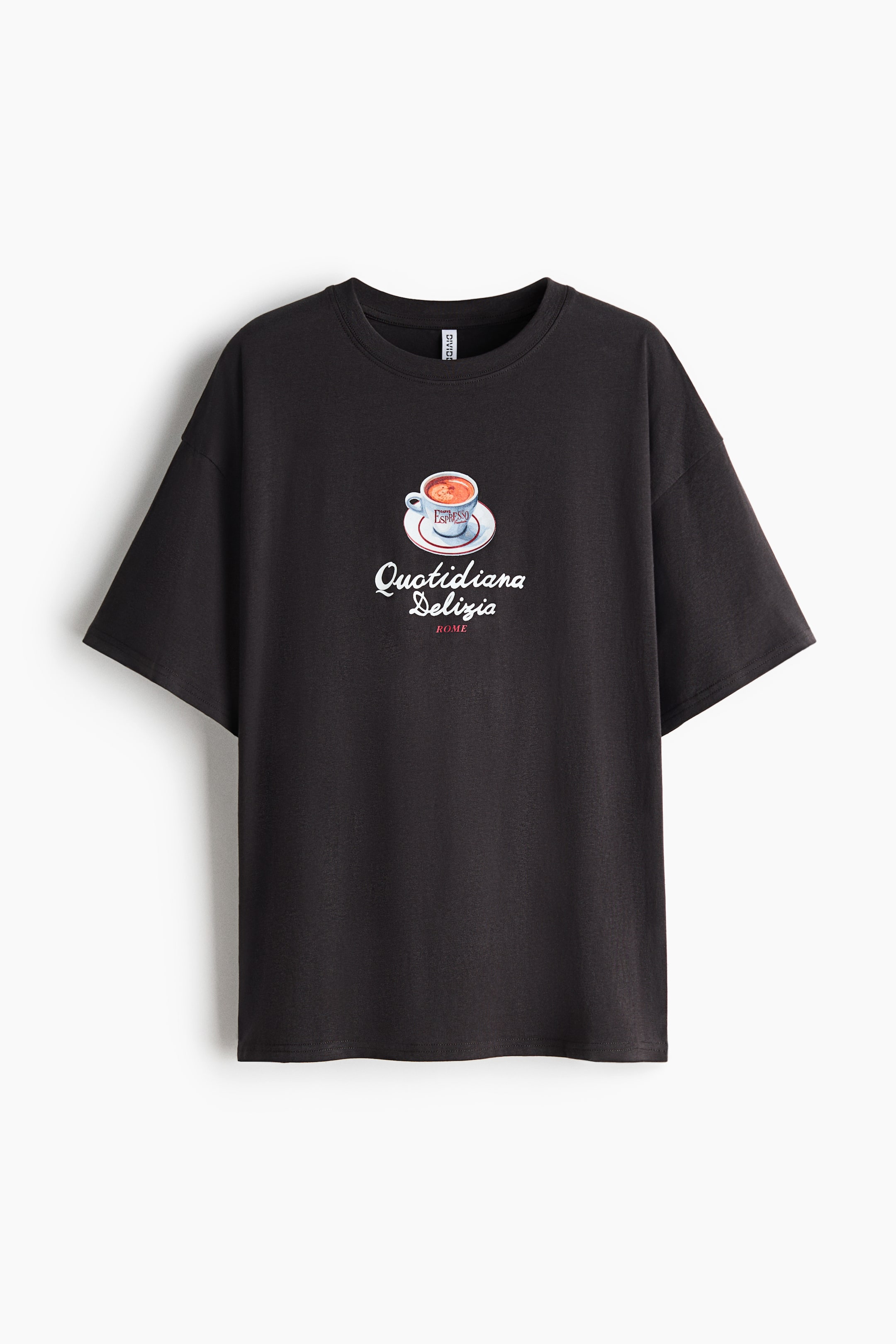 View larger image: A black t-shirt is presenting FRONT, featuring a round neck and short sleeves. A colourful graphic print is centred on the chest, depicting a white cup of espresso on a saucer, with "Quotidiana Delizia" in script below it, followed by "ROME".