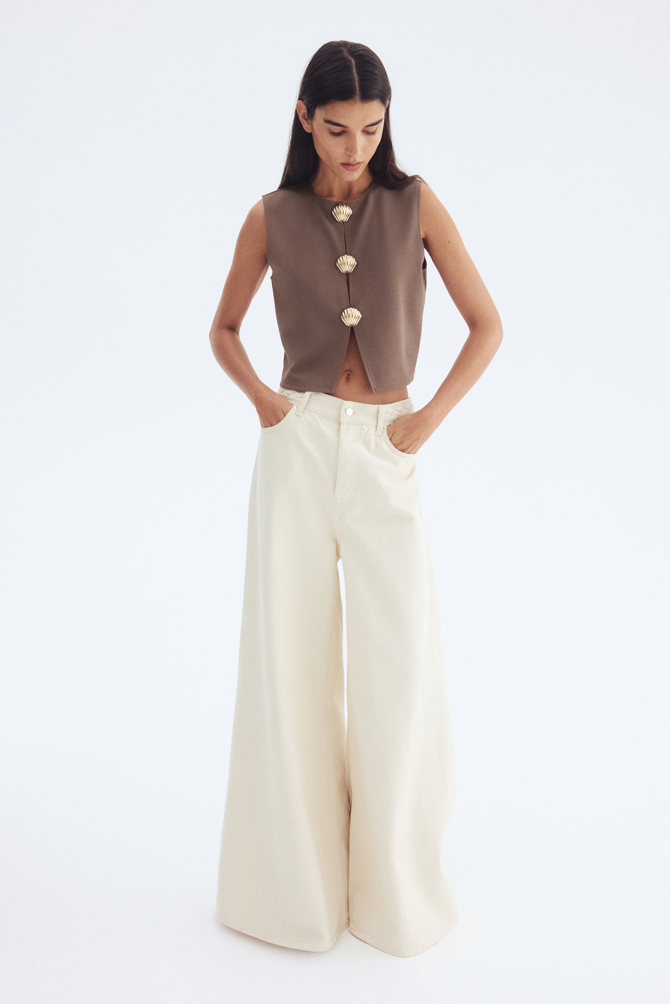 Button-decorated top