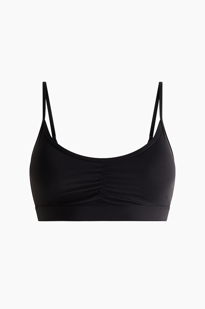 Top deportivo Medium Support con SculptMove™ - Negro/Rojo cereza - 1