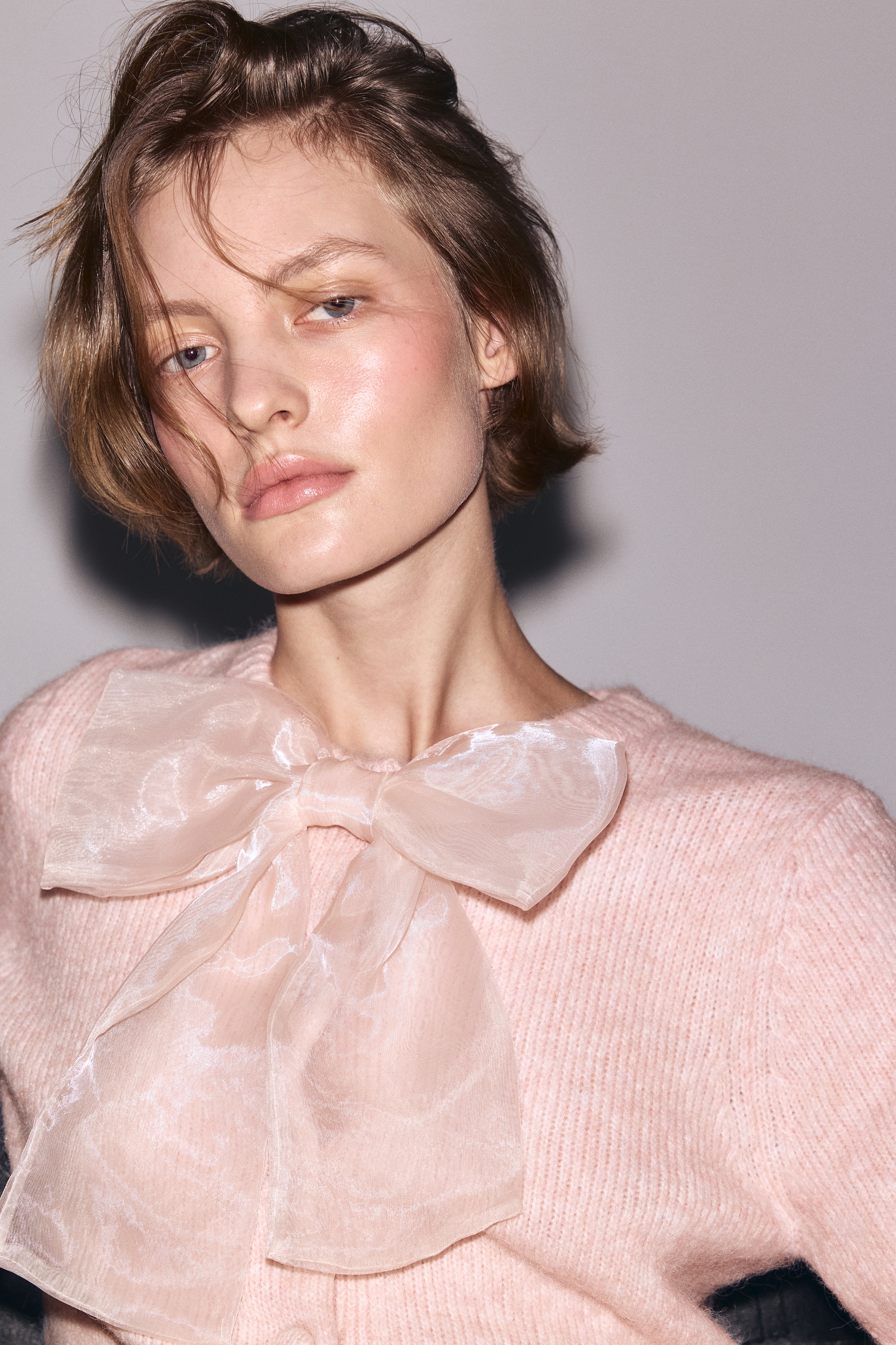Bow-detail knitted cardigan