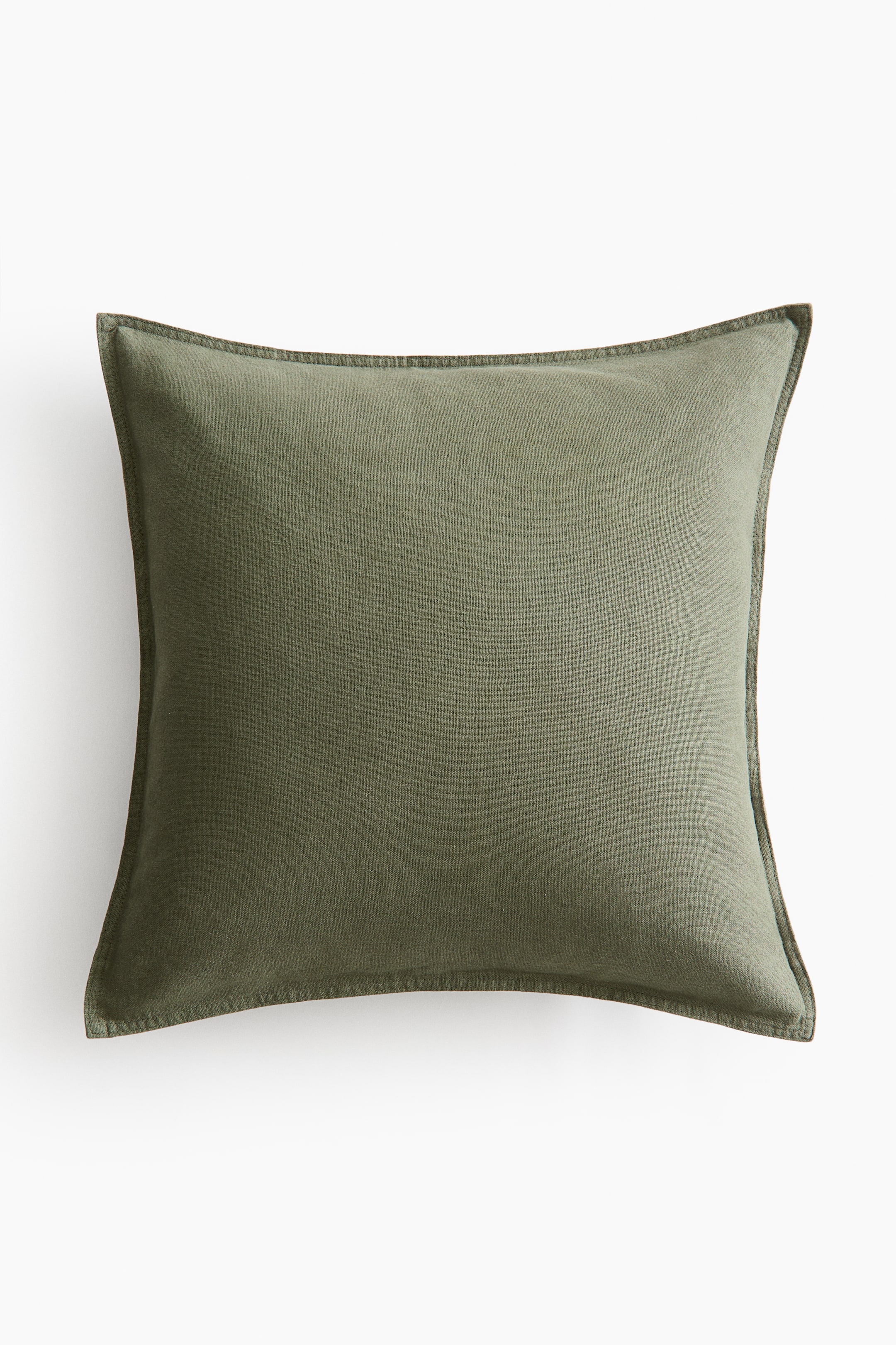 View larger image: A square cushion cover in an olive green linen and cotton weave is facing front. Darker stitching details its perimeter, creating a defined edge.