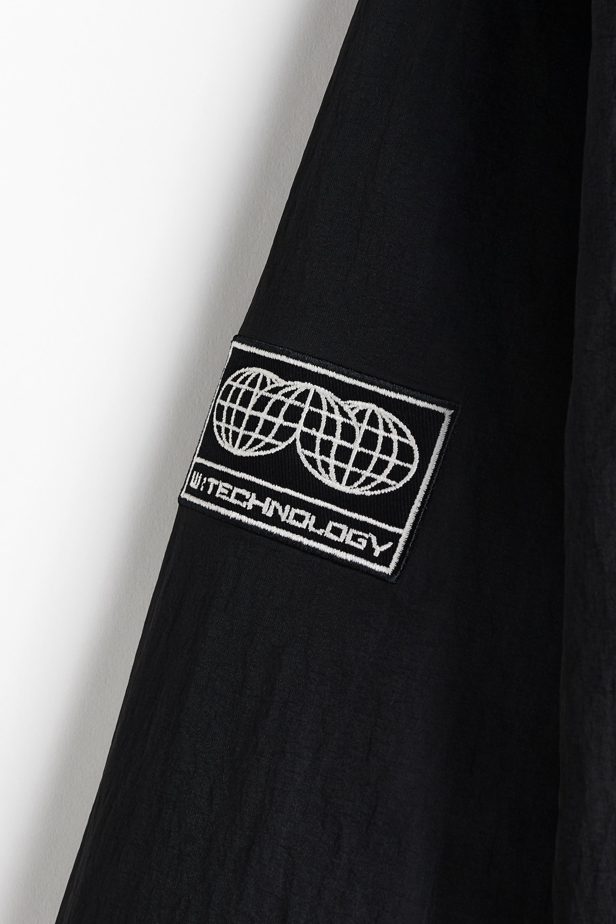 Veste coupe-vent matelassée en nylon