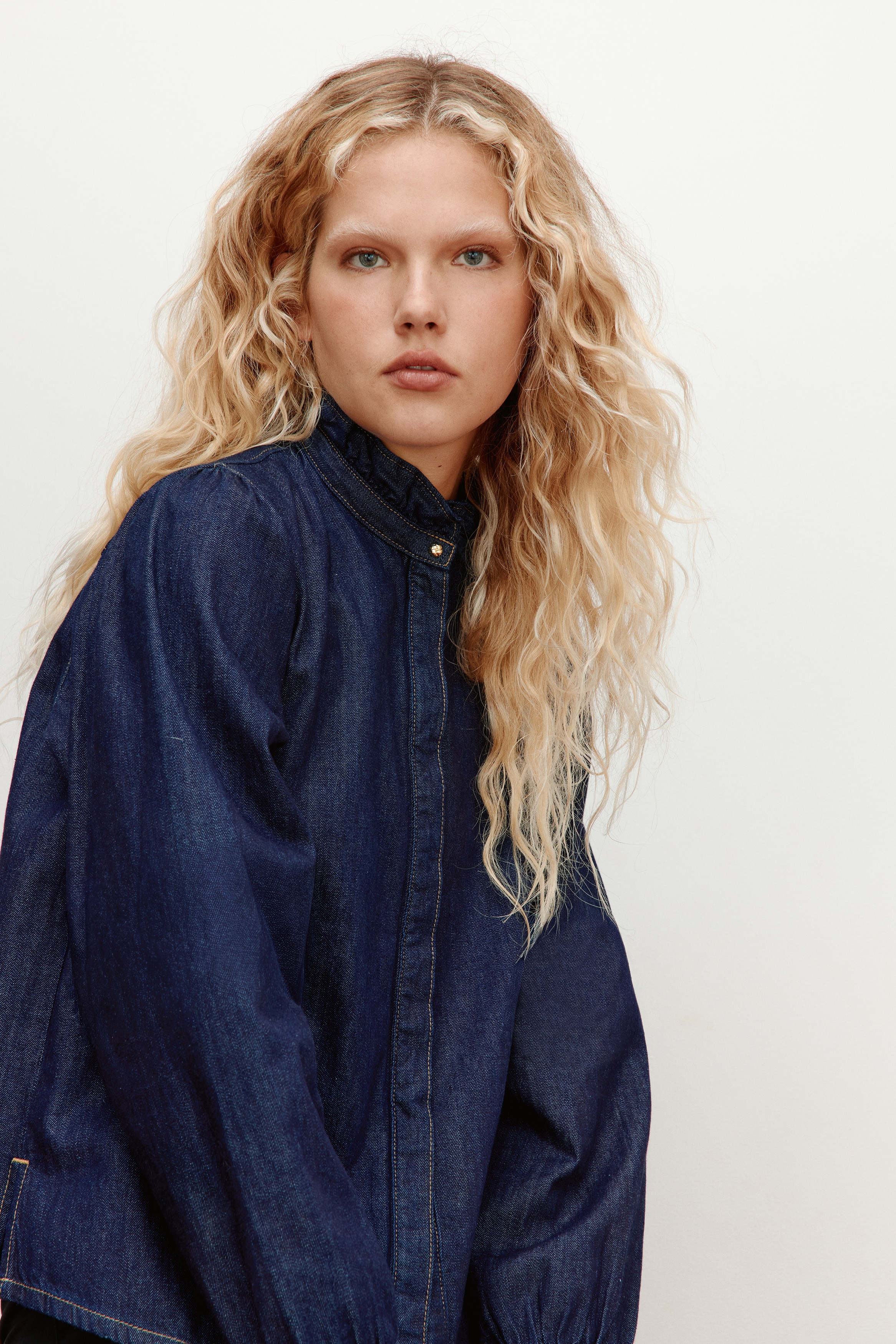 Frill-trimmed denim blouse