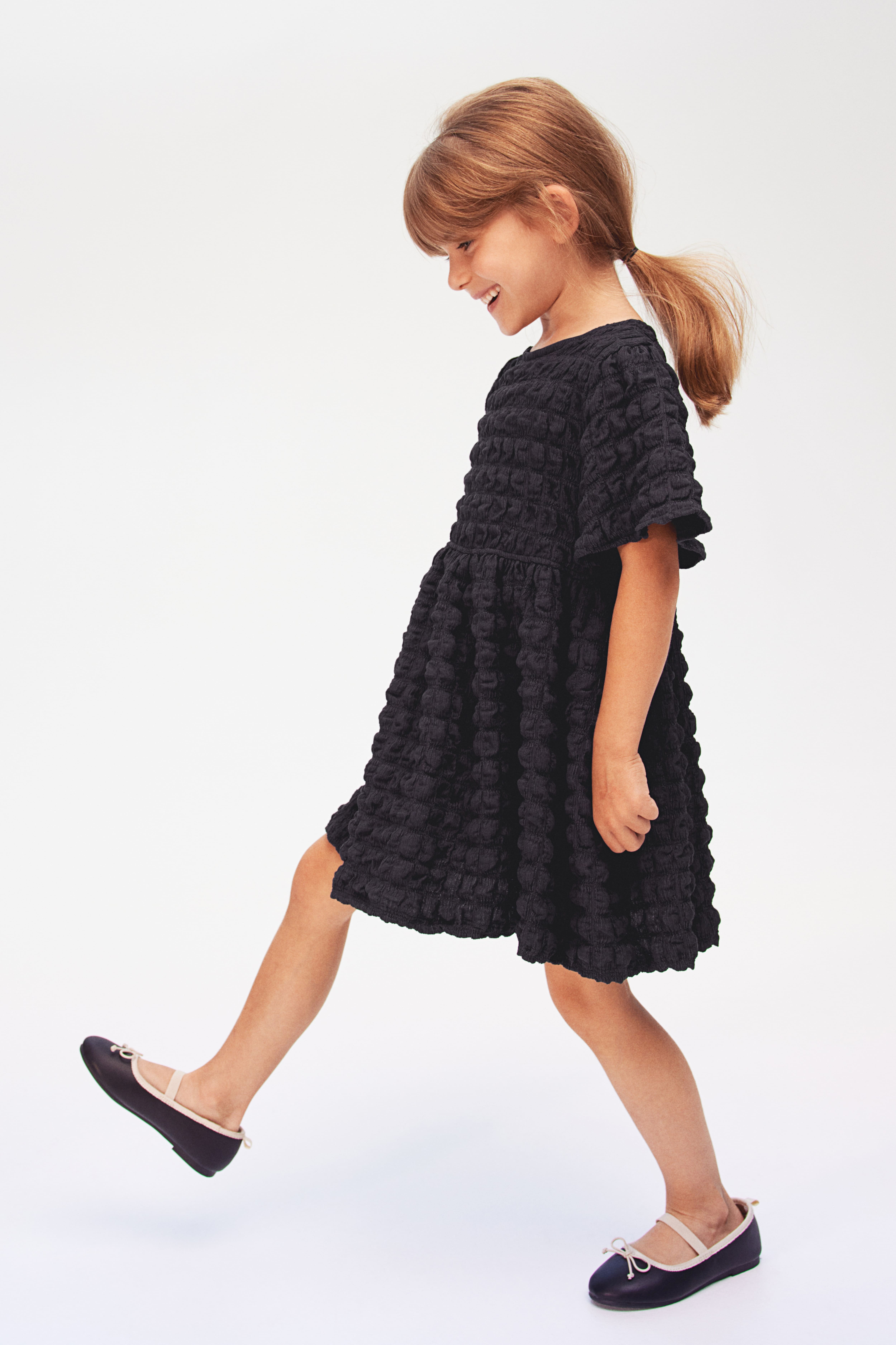 Girls black jersey fashion dress