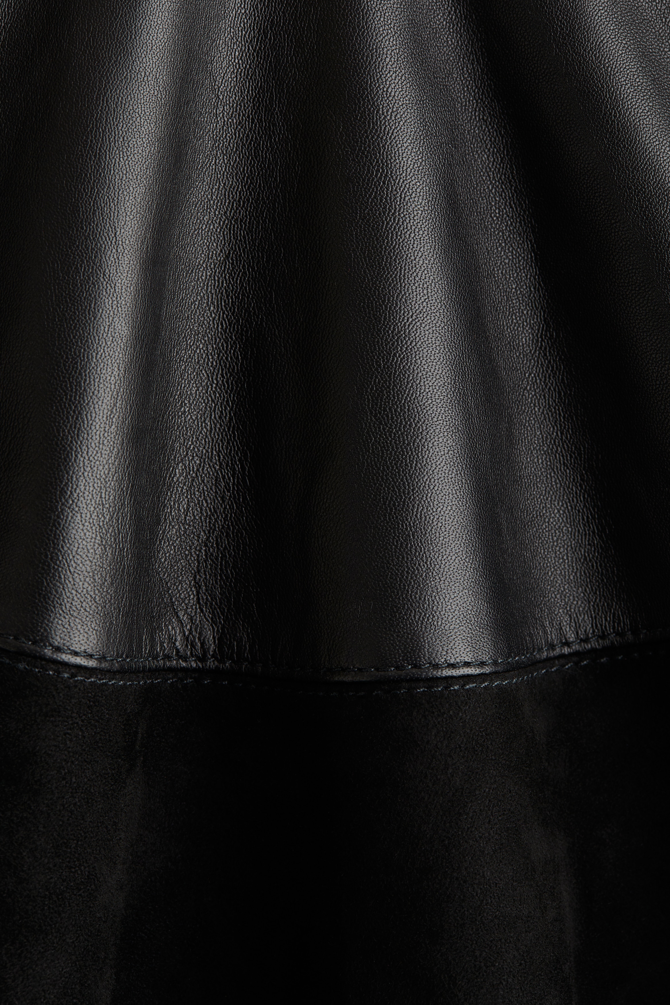Circular leather mini skirt