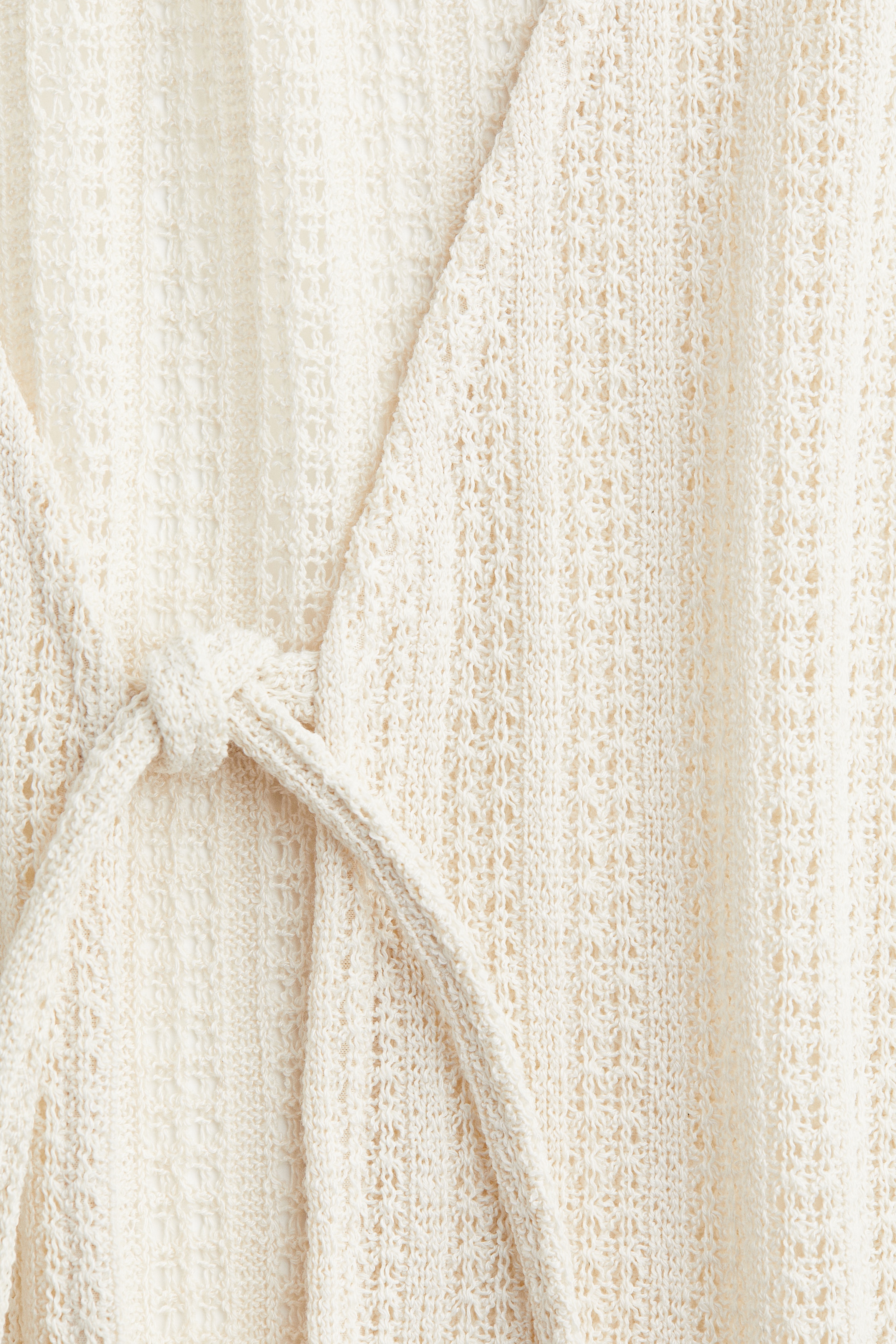 Knitted tie-front top