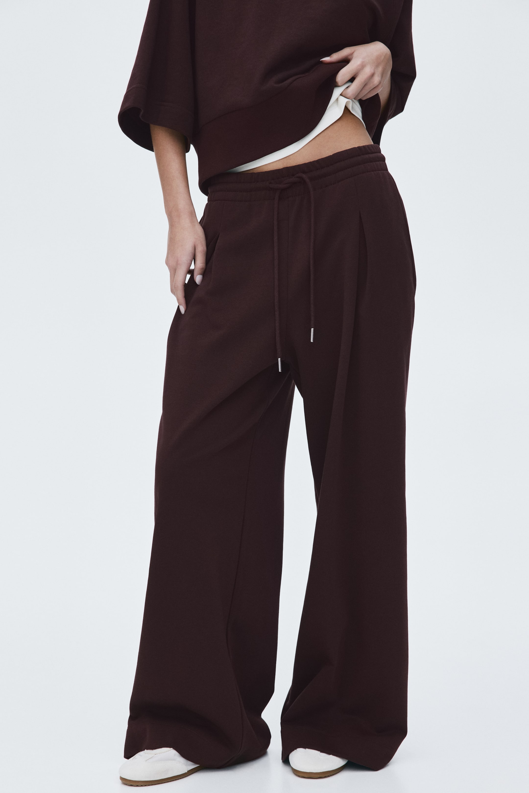 Pantalon avec cordon de serrage et plis