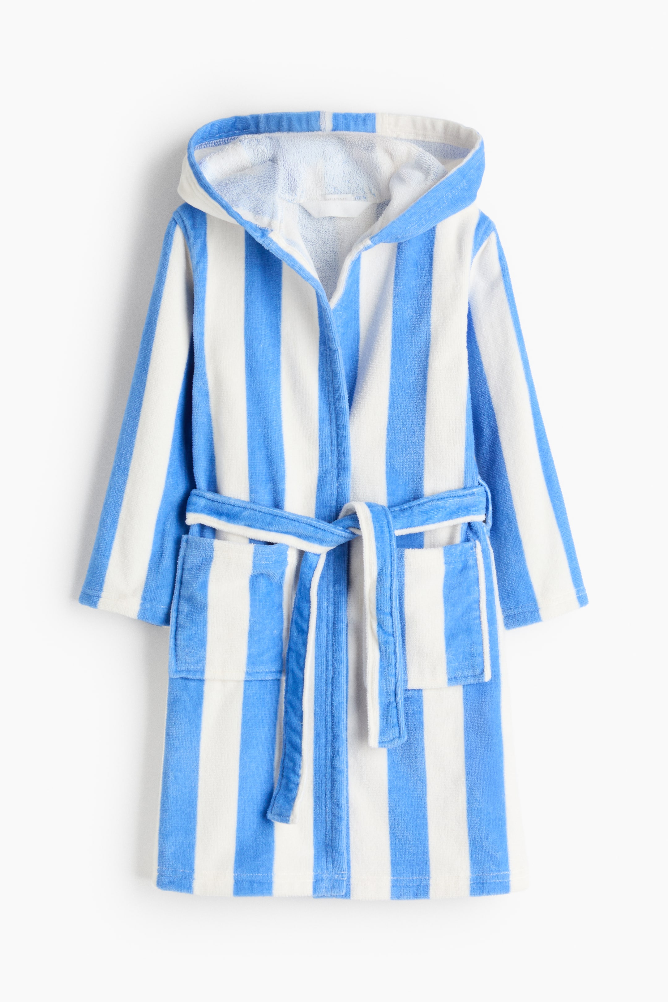 View larger image: Presenting the hooded dressing gown, FRONT, crafted from a plush, blue and white striped cotton terry fabric. This piece is designed with a hood, spacious patch pockets at the front, and a tie belt at the waist for a snug fit.