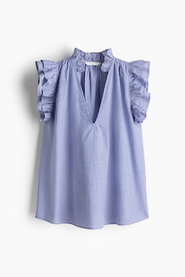 Blus med volanger