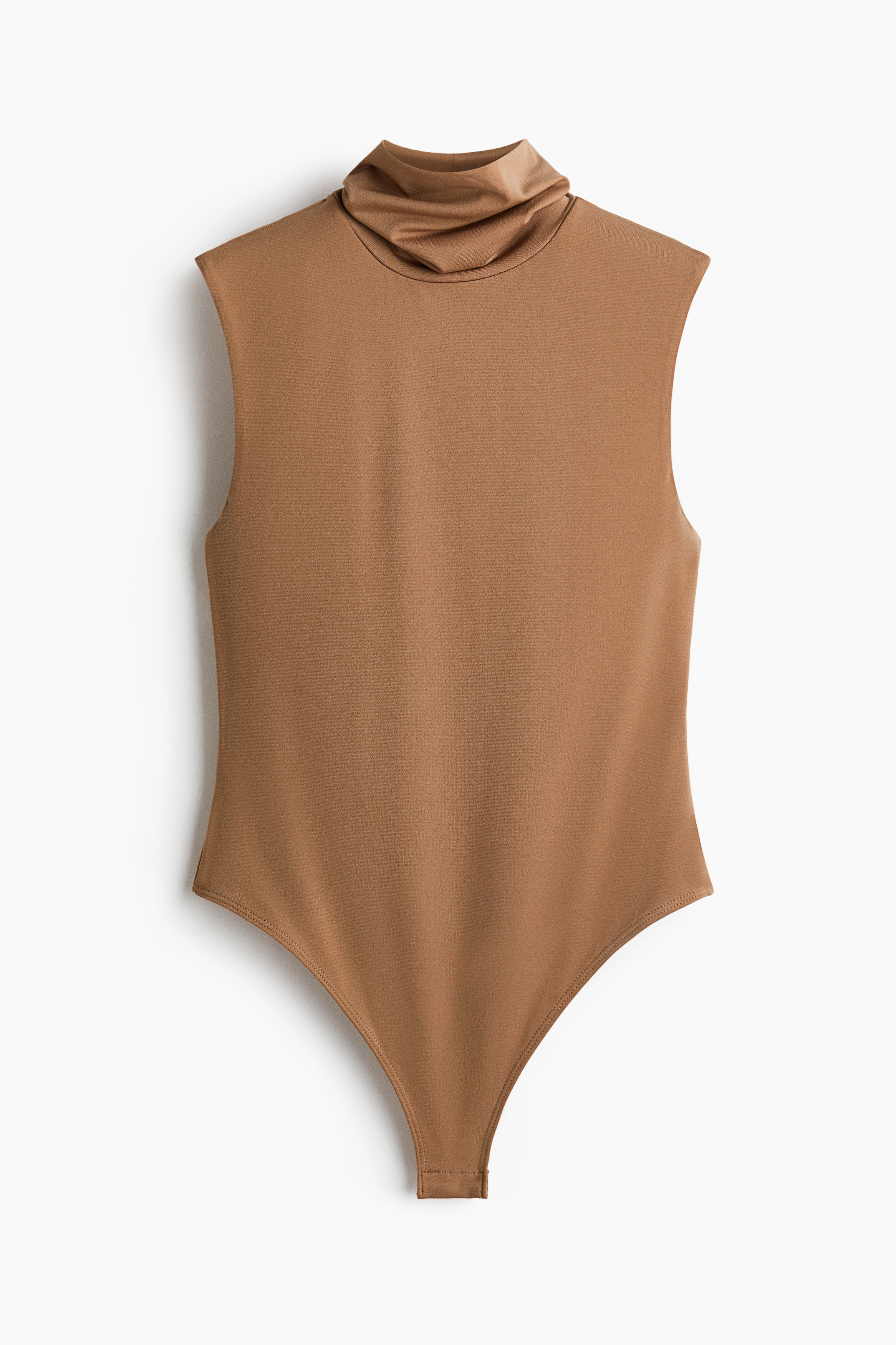 A camel-coloured sleeveless top with a draped turtleneck is worn by the model. The fitted top is made from a smooth, stretch fabric.