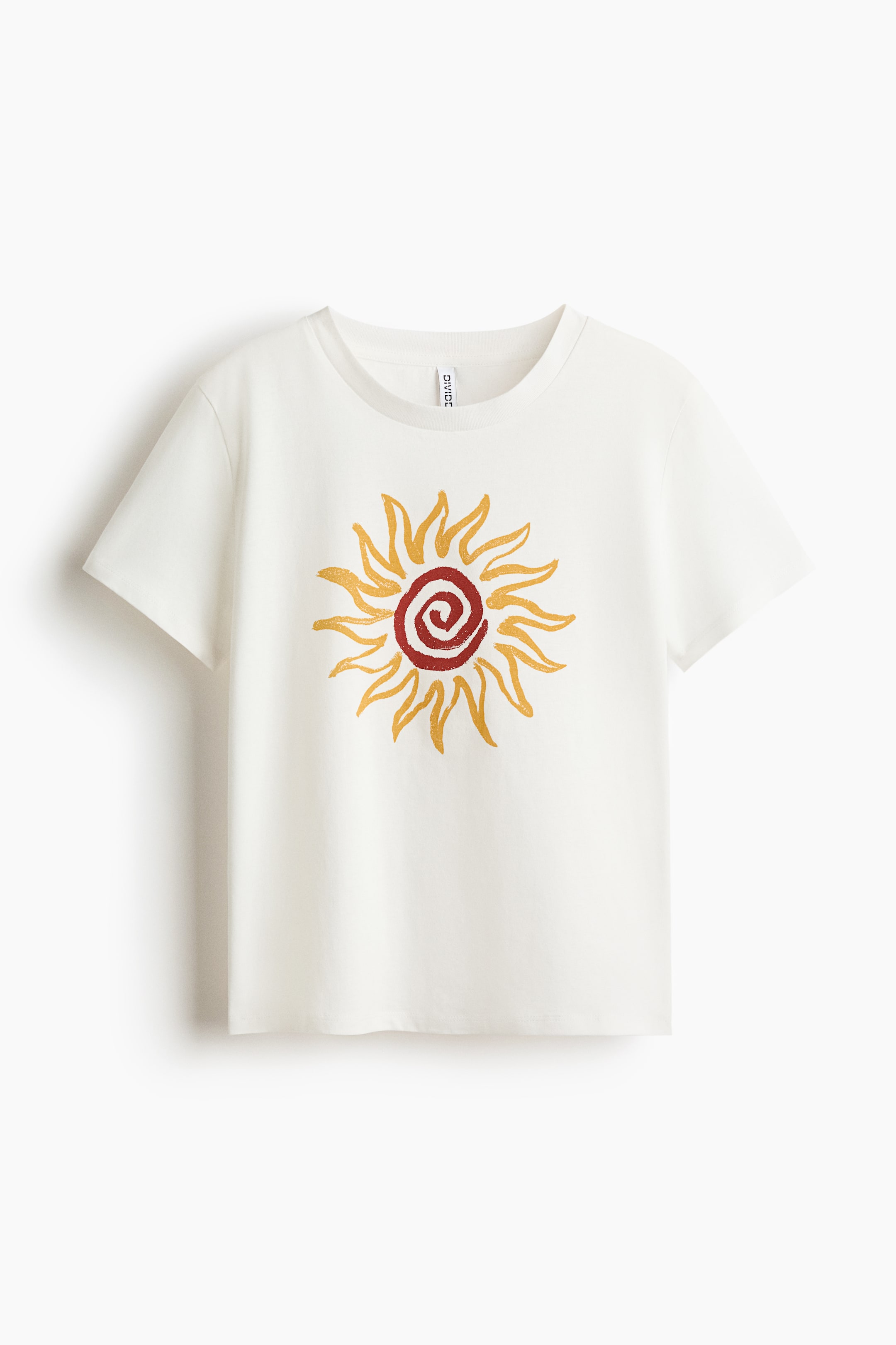 View larger image: A cream-coloured t-shirt featuring a round neck and short sleeves is shown from the front. The front showcases a stylized sun graphic, with a dark red spiral centre and yellow, brushstroke-like rays.