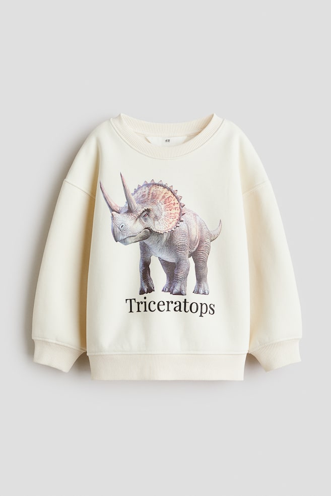 Sweatshirt mit Print - Weiß/Triceratops/Grün gestreift/Dinosaurier/Marineblau/Club de Tennis/Marineblau/Dinosaurier/Hellbeige/NASA/Grün/London/Cremefarben/Schwarz/Dunkelgrau/Football legend/Dunkelblau/Arizona/Dunkelgrau/St Moritz - 1