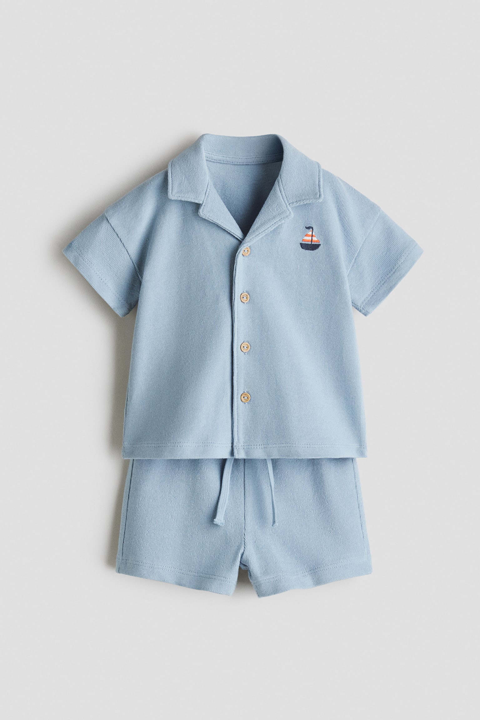 Conjunto de 2 piezas en punto de algodón - Azul claro/Barco de vela/Verde claro/Peces/Blanco/Dinosaurios/Café/Palmeras/Azul marino/Franjas/Verde oscuro/Palmeras/Beige claro/Rayas azules