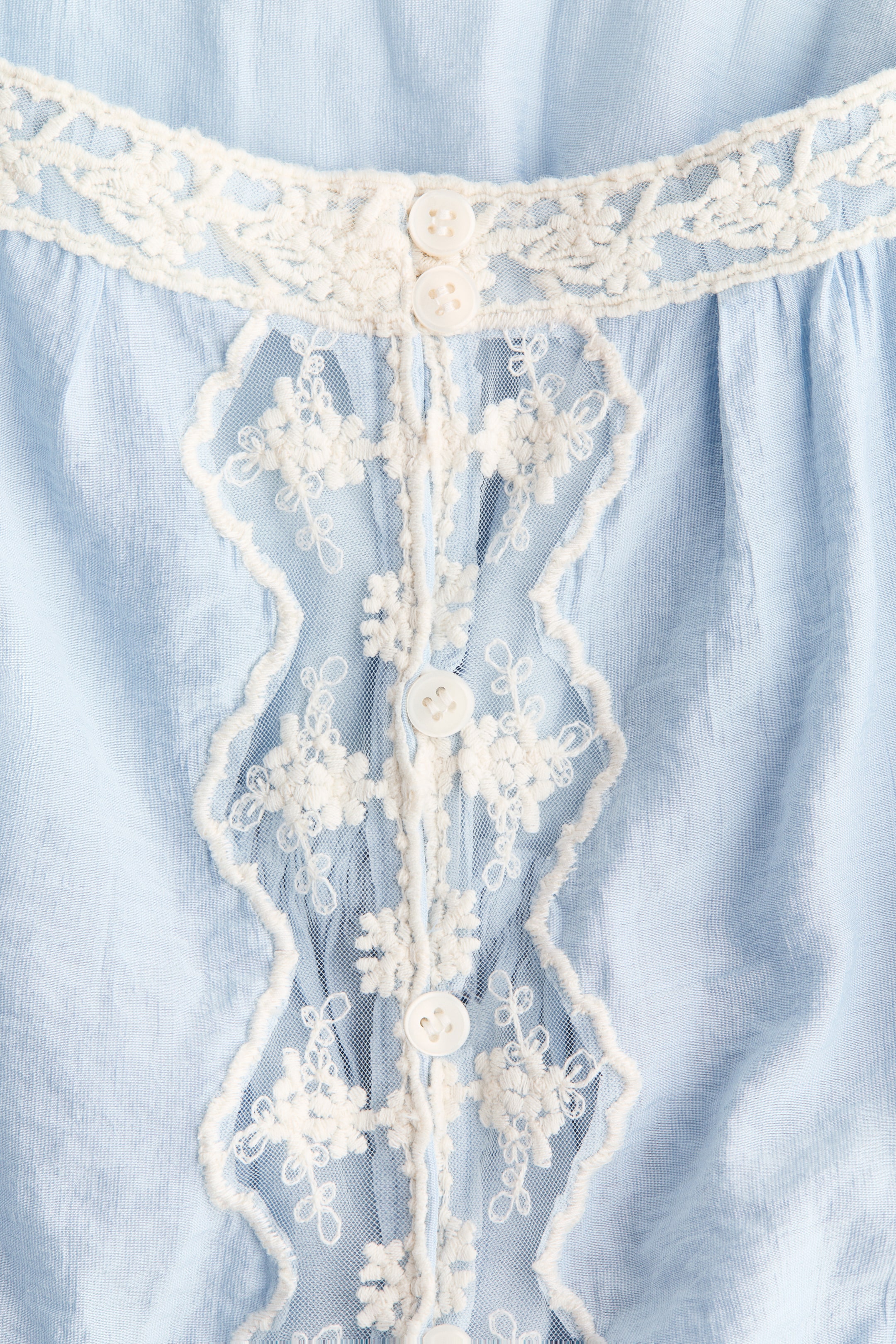 Lace-Trimmed Peplum Top