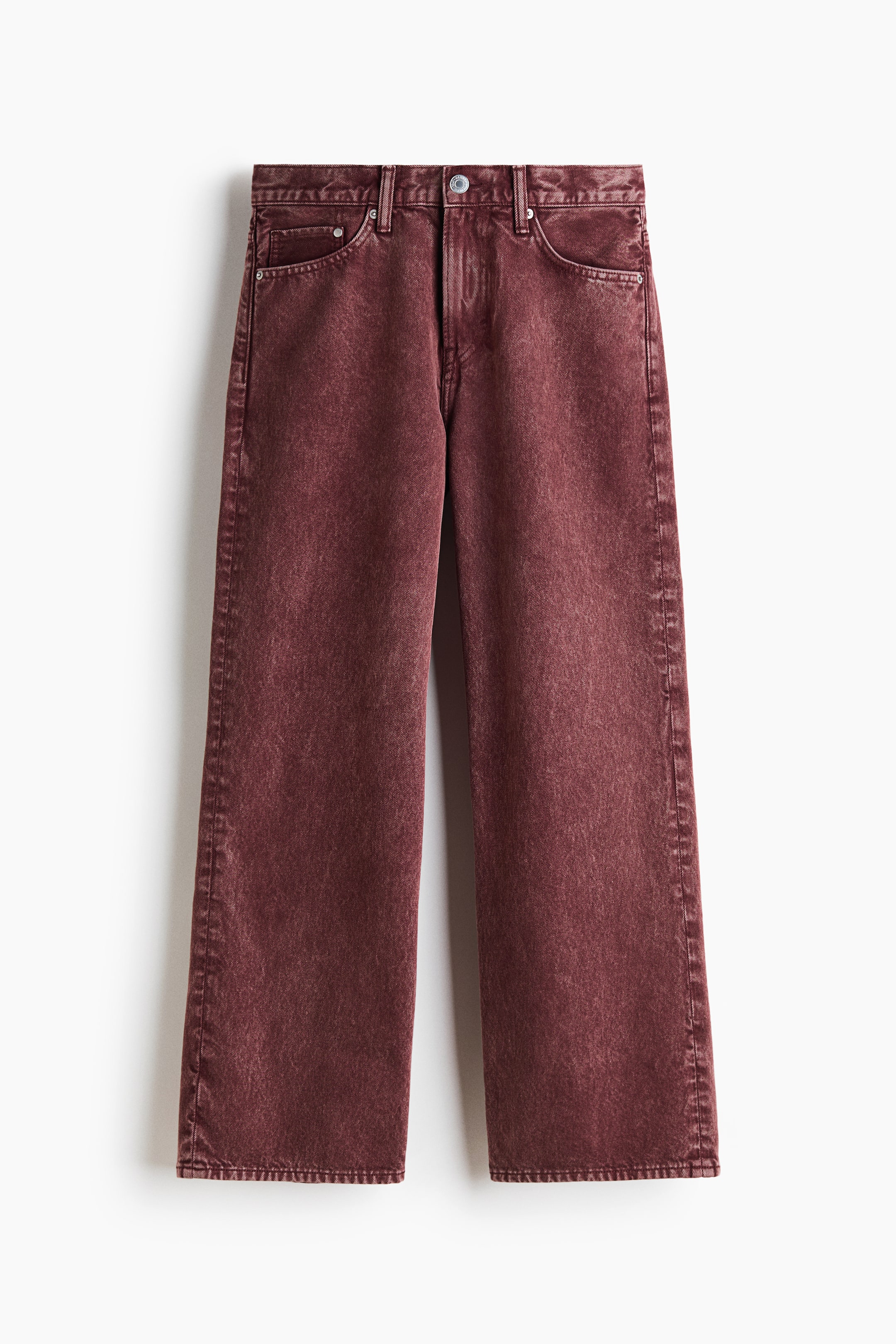 View larger image: A pair of burgundy 5-pocket jeans in washed cotton denim is shown from the front, featuring a loose fit with wide, straight legs and a dropped crotch. The jeans include a regular waist with belt loops, classic front pockets, and a single metal button closure.
