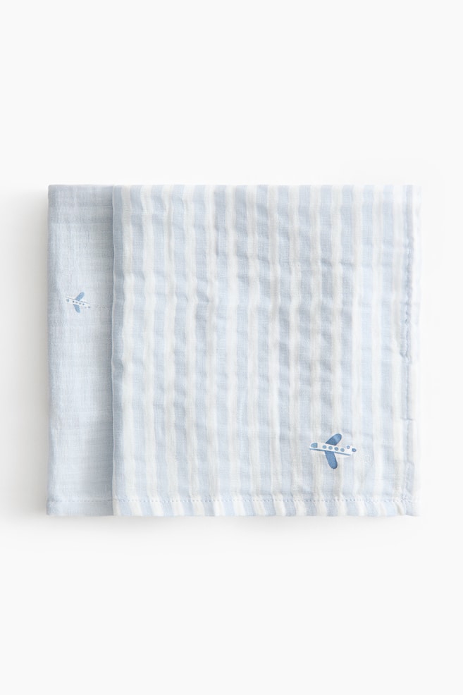 2-Pack Muslin Cloths - Light blue/planes/White/cherries/White/elephants/Light pink/floral/Light beige/fish/White/dogs - 1