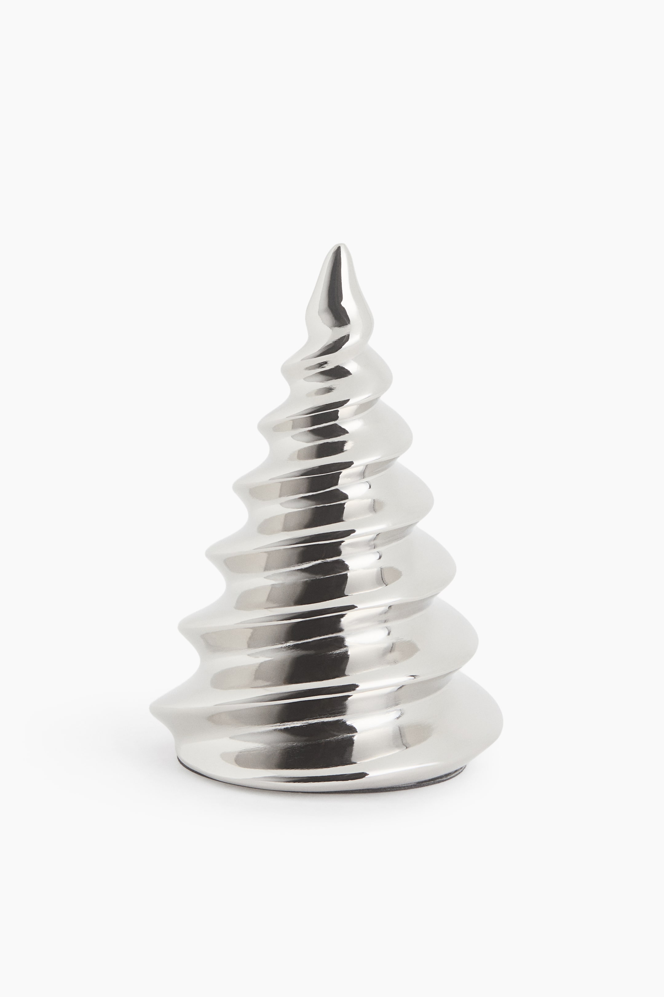 View larger image: A stylized, tree-shaped figurine stands upright, facing forward, showcasing a highly reflective, polished silver finish. The decorative piece features a continuous, smooth spiral pattern winding upward to a tapered point, creating a twisted conical structure.