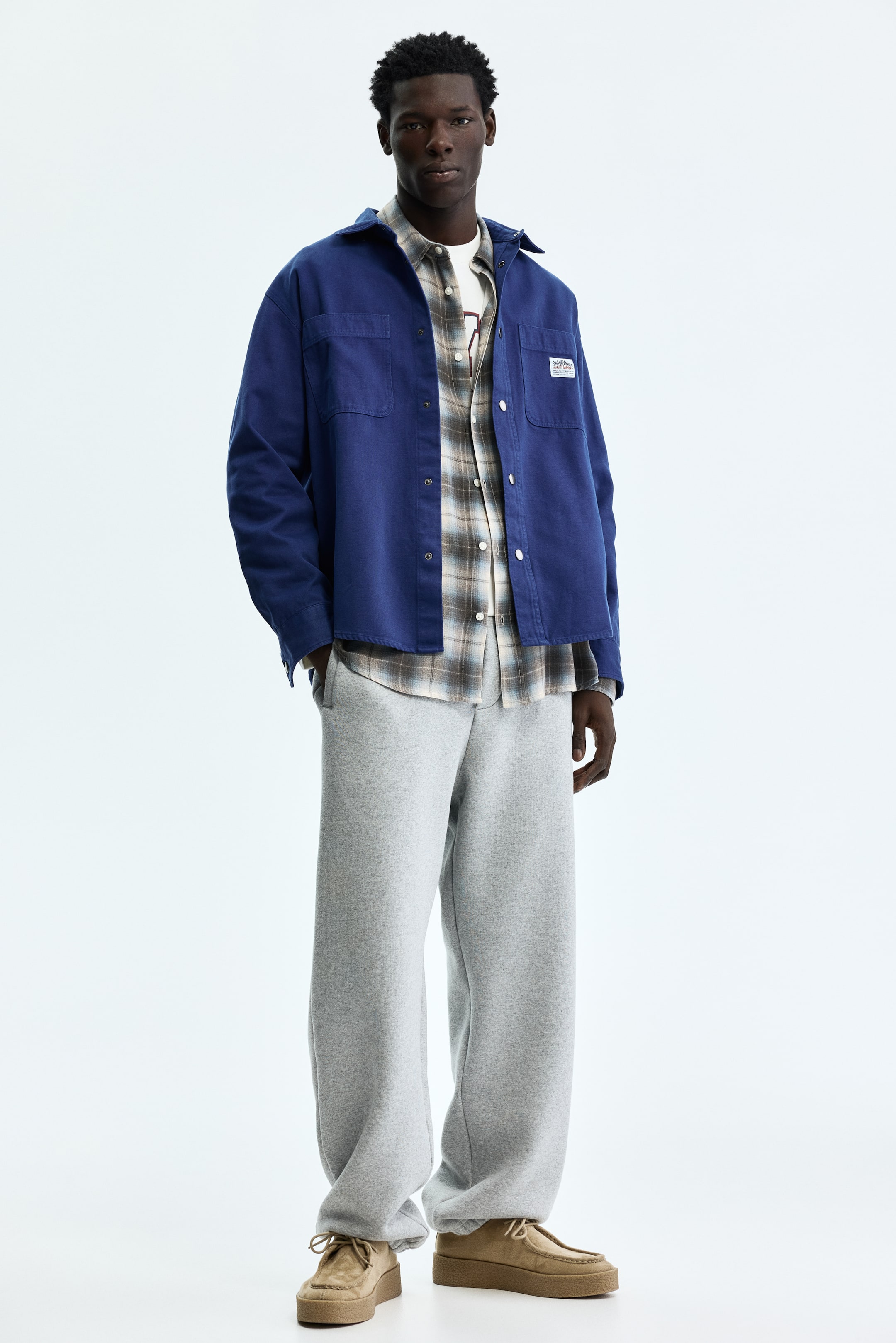 Переглянути збільшене зображення: Спортивні штани Relaxed Fit - Сірий меланж - Men | H&M UA 1