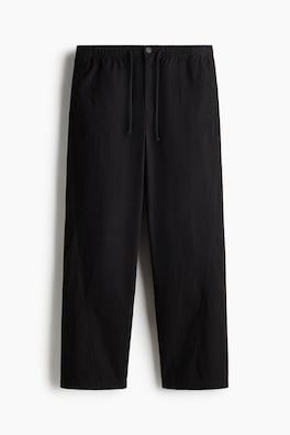 Byxa med vridna sömmar Relaxed Fit
