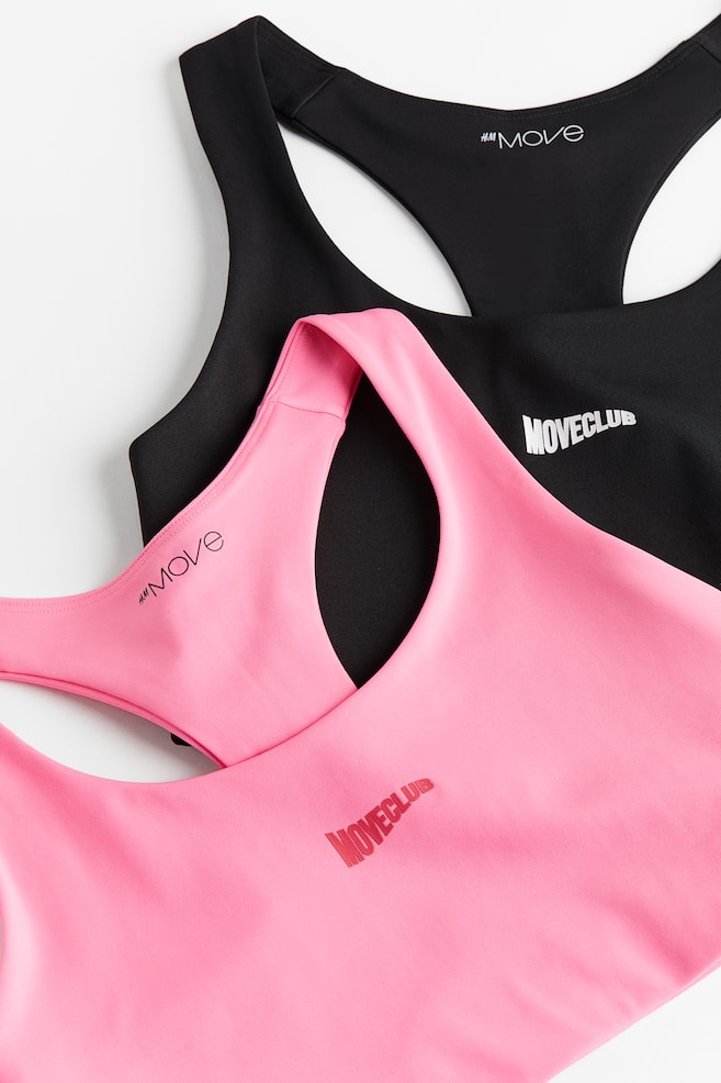 2-pack Medium support sports bras - Bubblegum pink/Black/Black/White/Light purple/Navy blue/Dark green/Black - 2