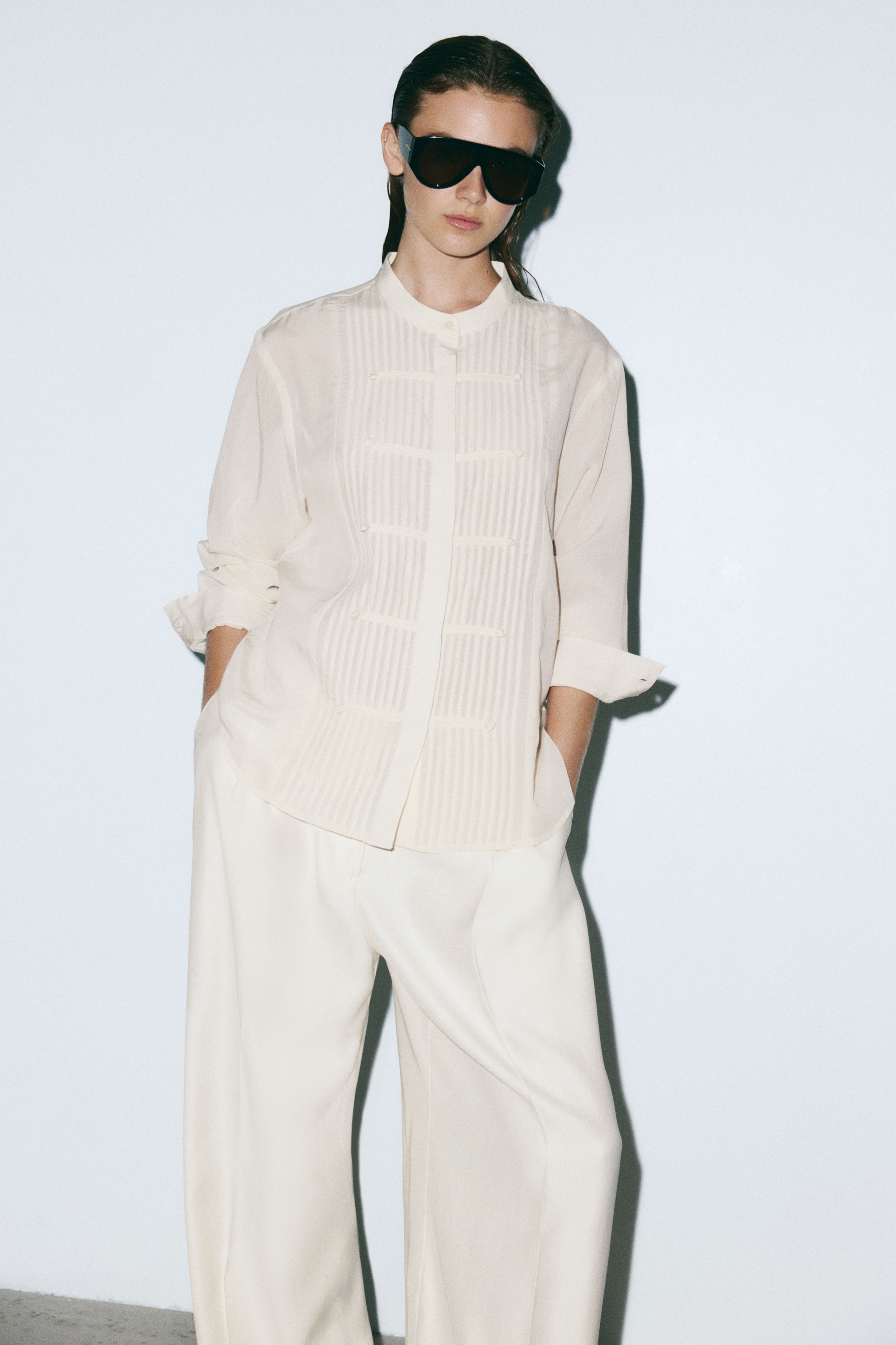Blouse à boutons avec plis nervure