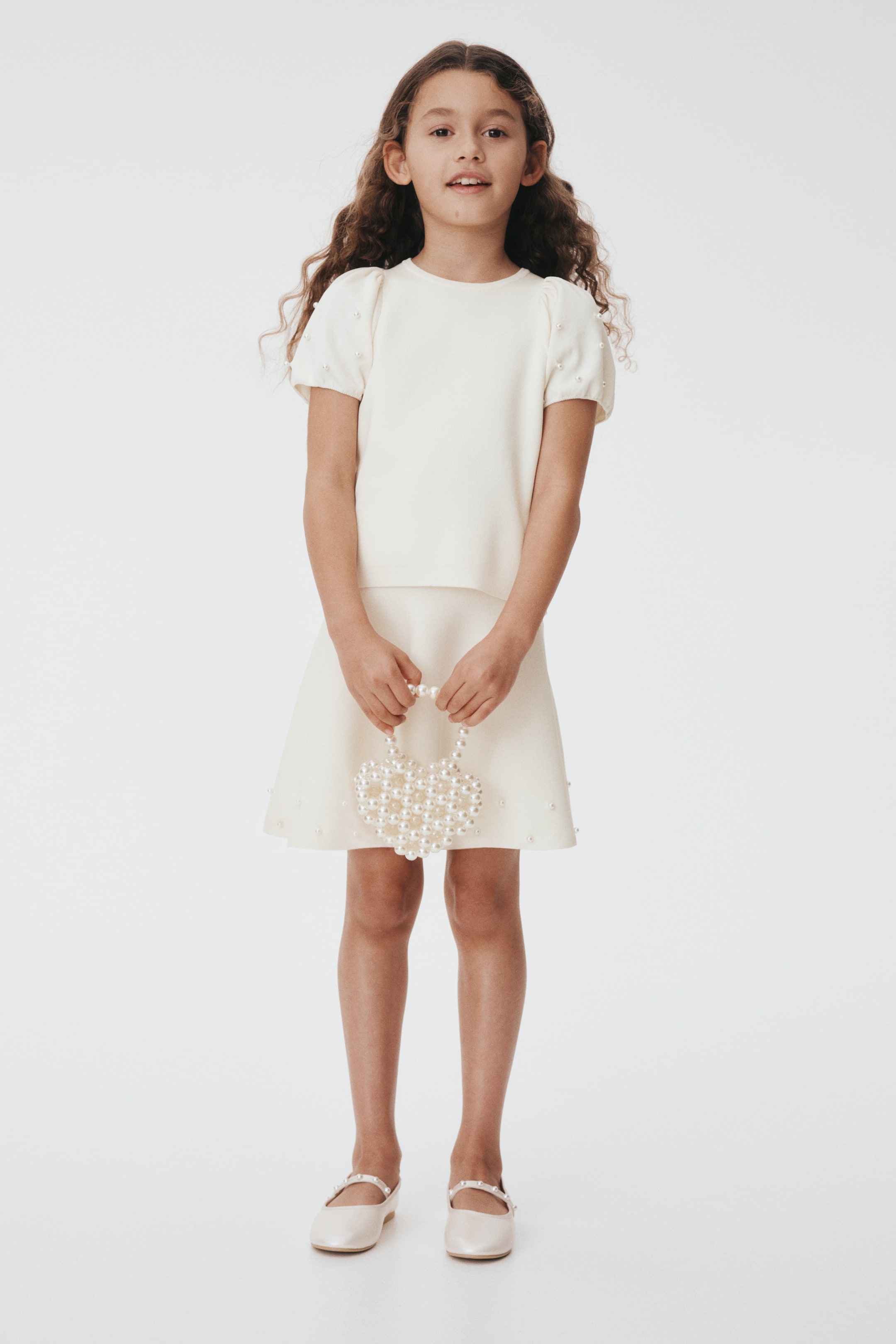 Haut en fin tricot avec perles de fantaisie