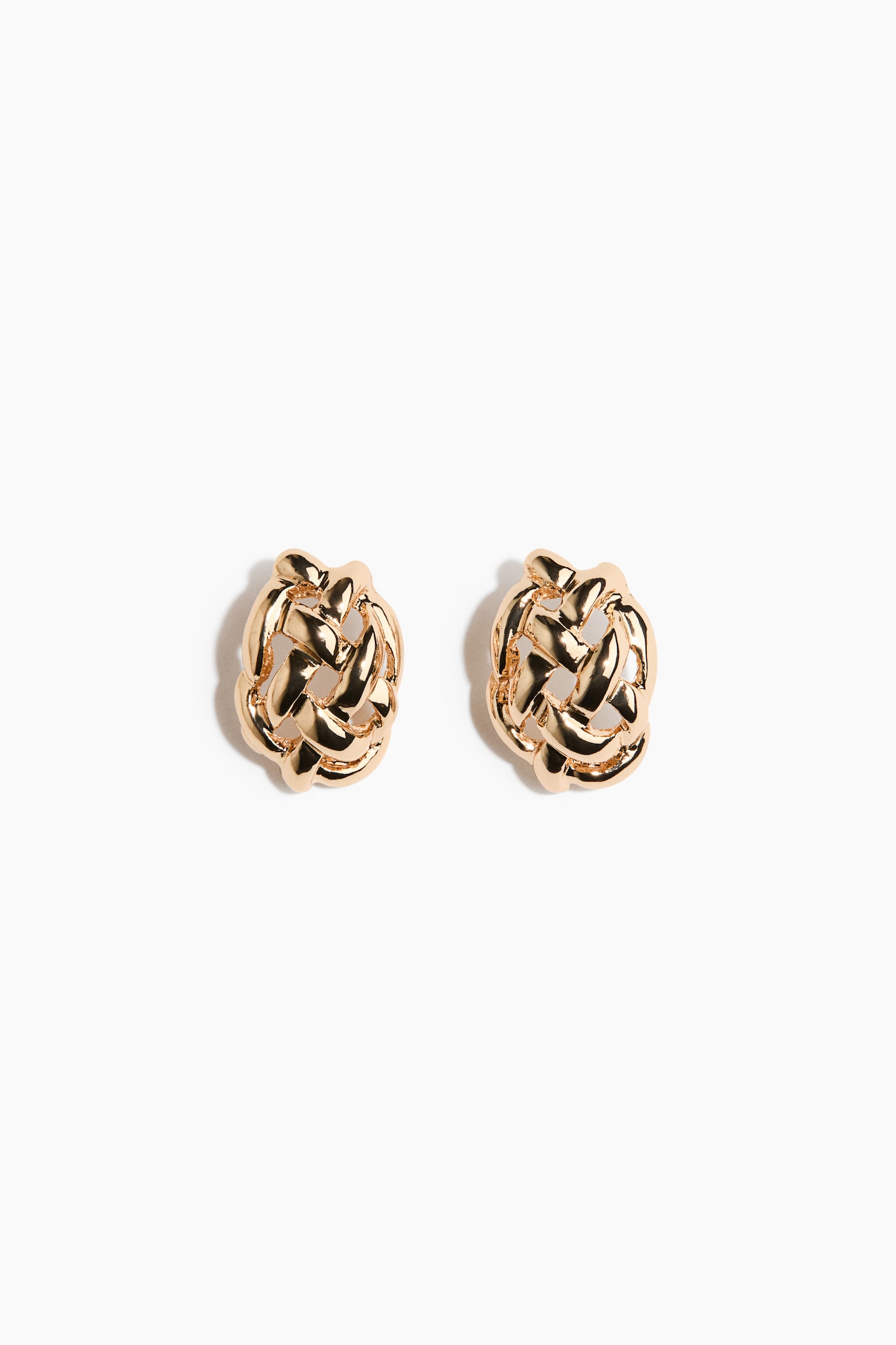 A pair of gold stud earrings featuring a woven knot design. Each earring displays intertwining polished gold bands, creating a rounded, textured appearance. - 1
