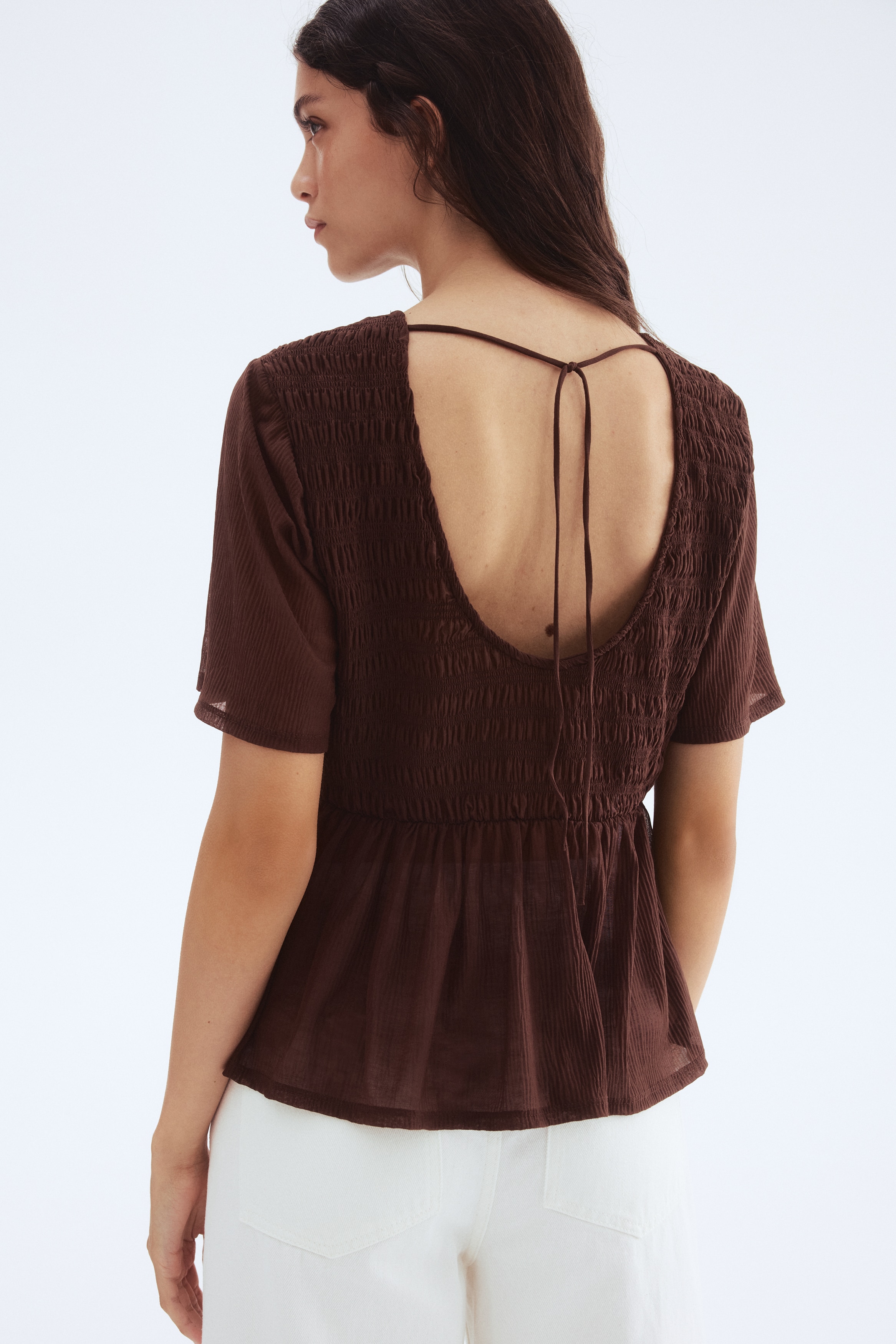 Smocked peplum top