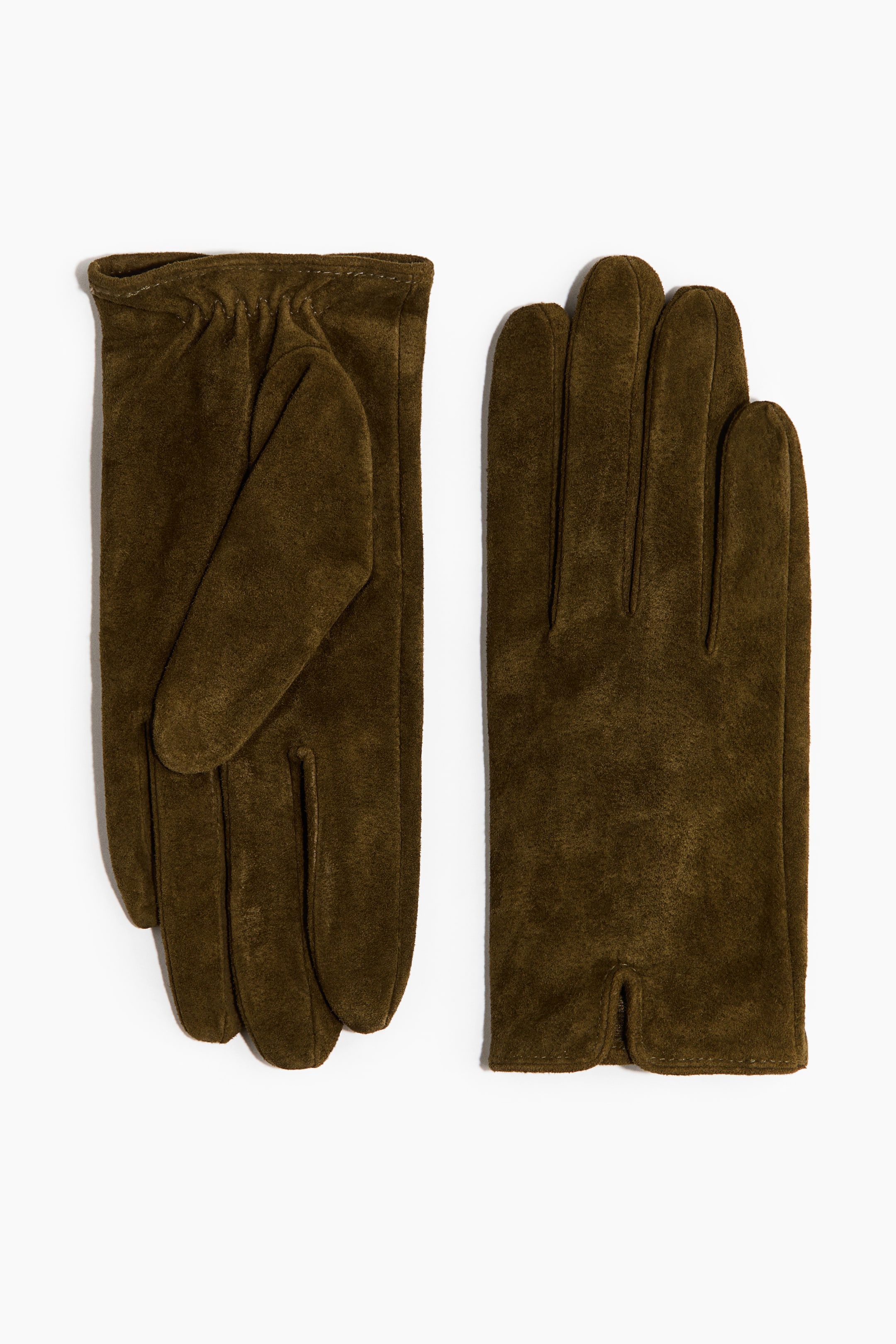 View larger image: A pair of olive green suede gloves is displayed. One glove is facing palm up, featuring an elasticized gathered wrist. The other glove is facing palm down, showing a small vent at the wrist.