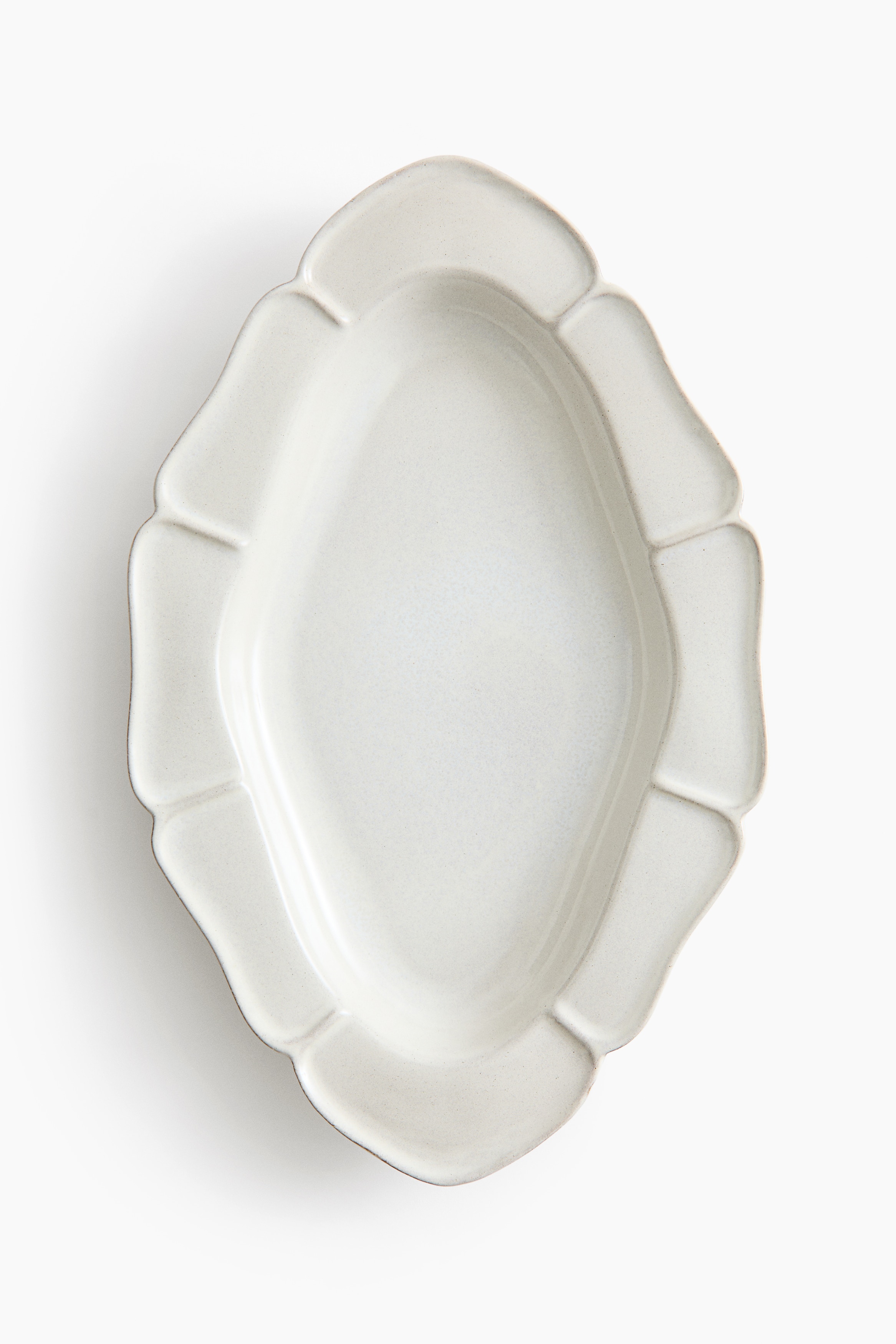 Grande assiette de service en terre cuite émailléeModèle
