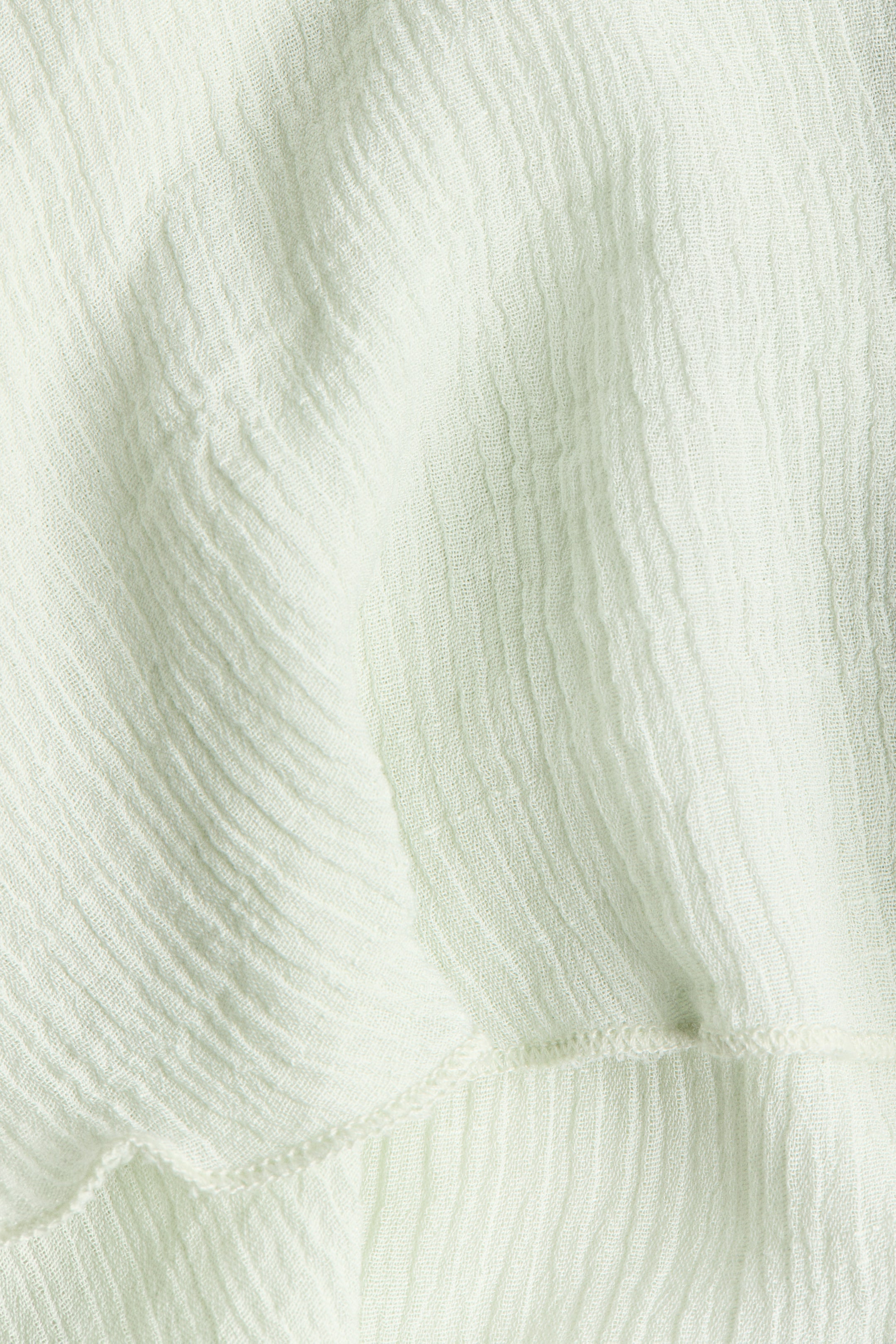 Robe asymétrique à volant