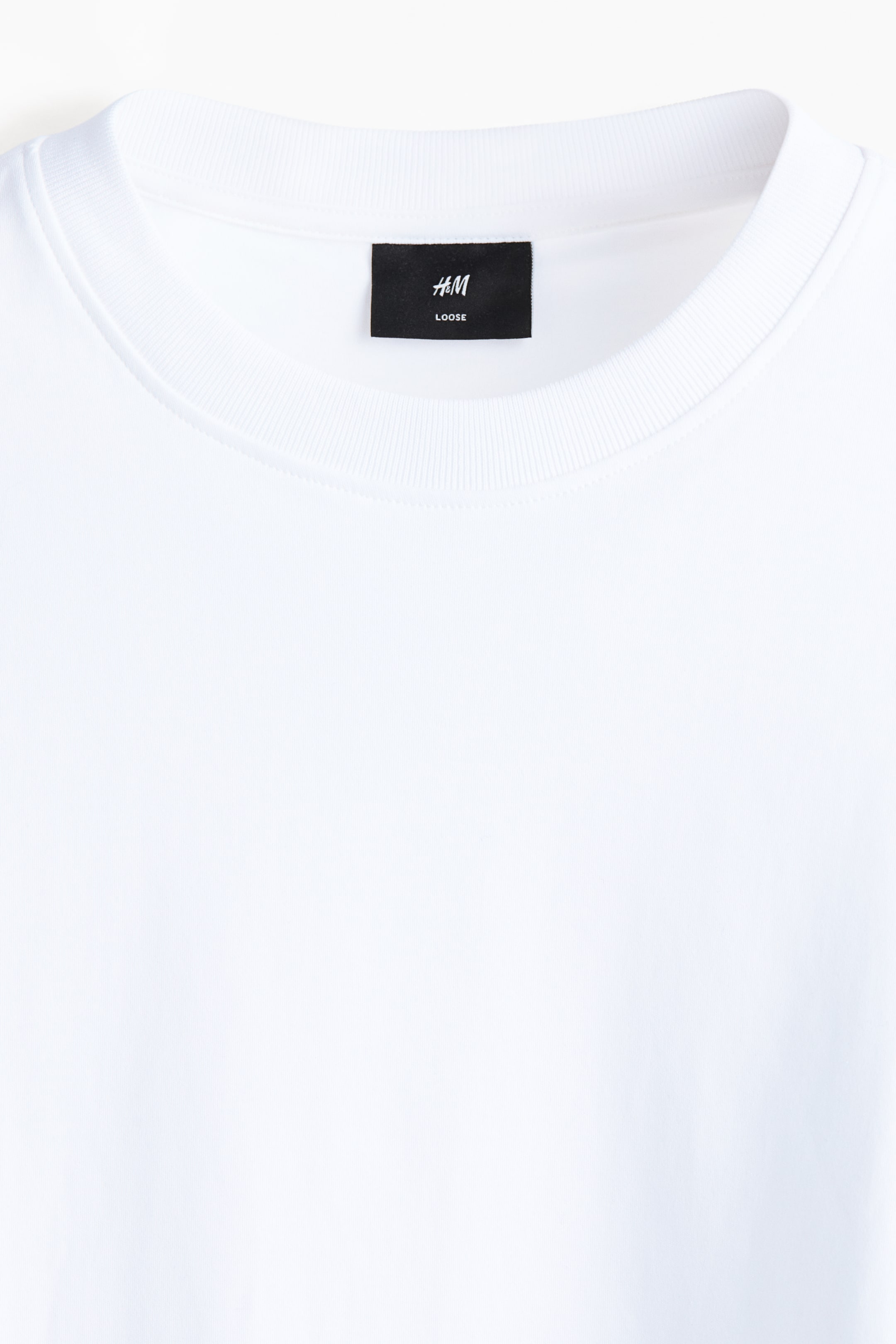 הצגת תמונה גדולה יותר: טישירט Oversized Fit - לבן - Men | H&M IL 2