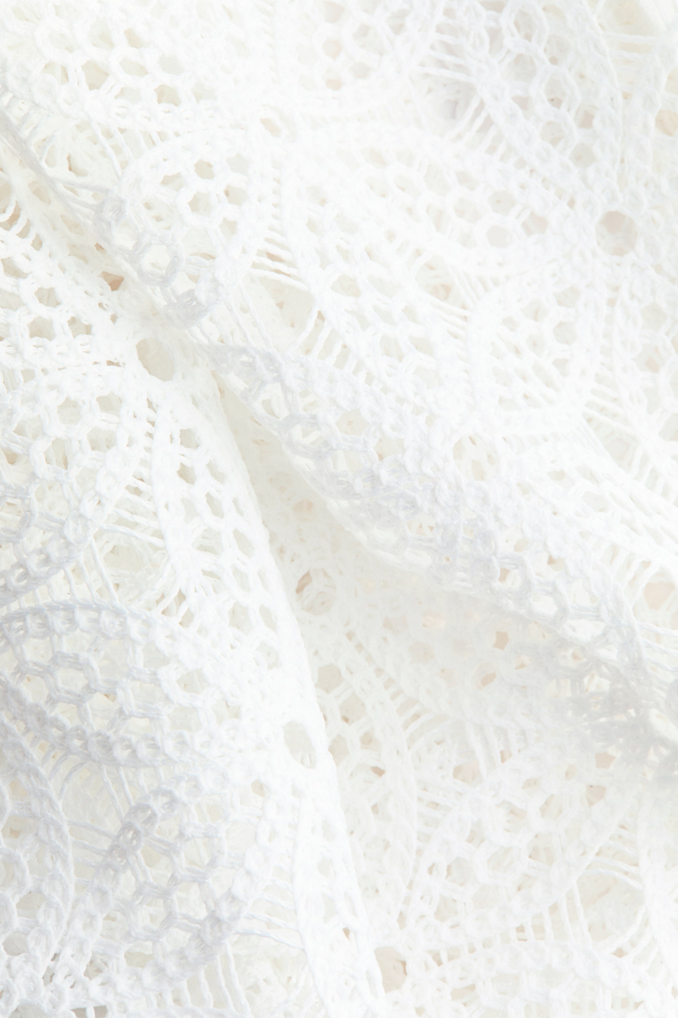 Robe à dos nu en dentelle