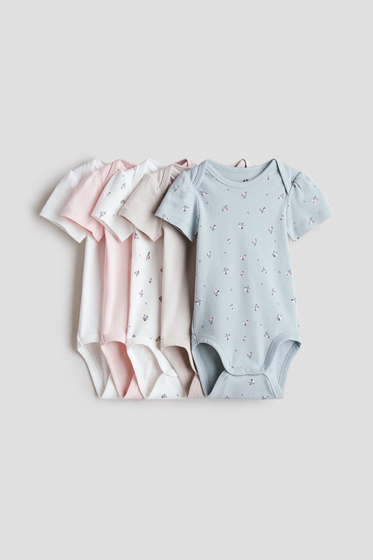 Lot de 5 bodies en coton - Bleu clair/fleurs/Beige clair/chiens/Blanc/animaux/Bleu clair/dinosaures/Rose/baies/Beige/lapin/Bleu/ancres/Gris/rayé/Rose/cœurs/Rose/cœurs/Vert clair/fruits/Vert clair/pois