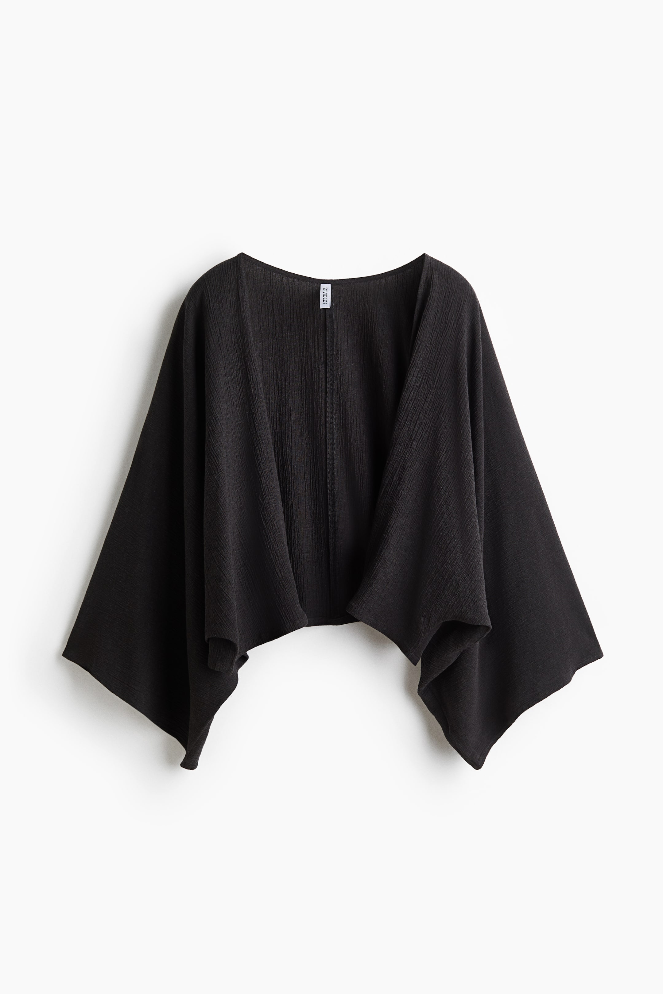 View larger image: The black blouse, shown from the FRONT, features a crinkled weave, an open front and wide 3/4-length sleeves.