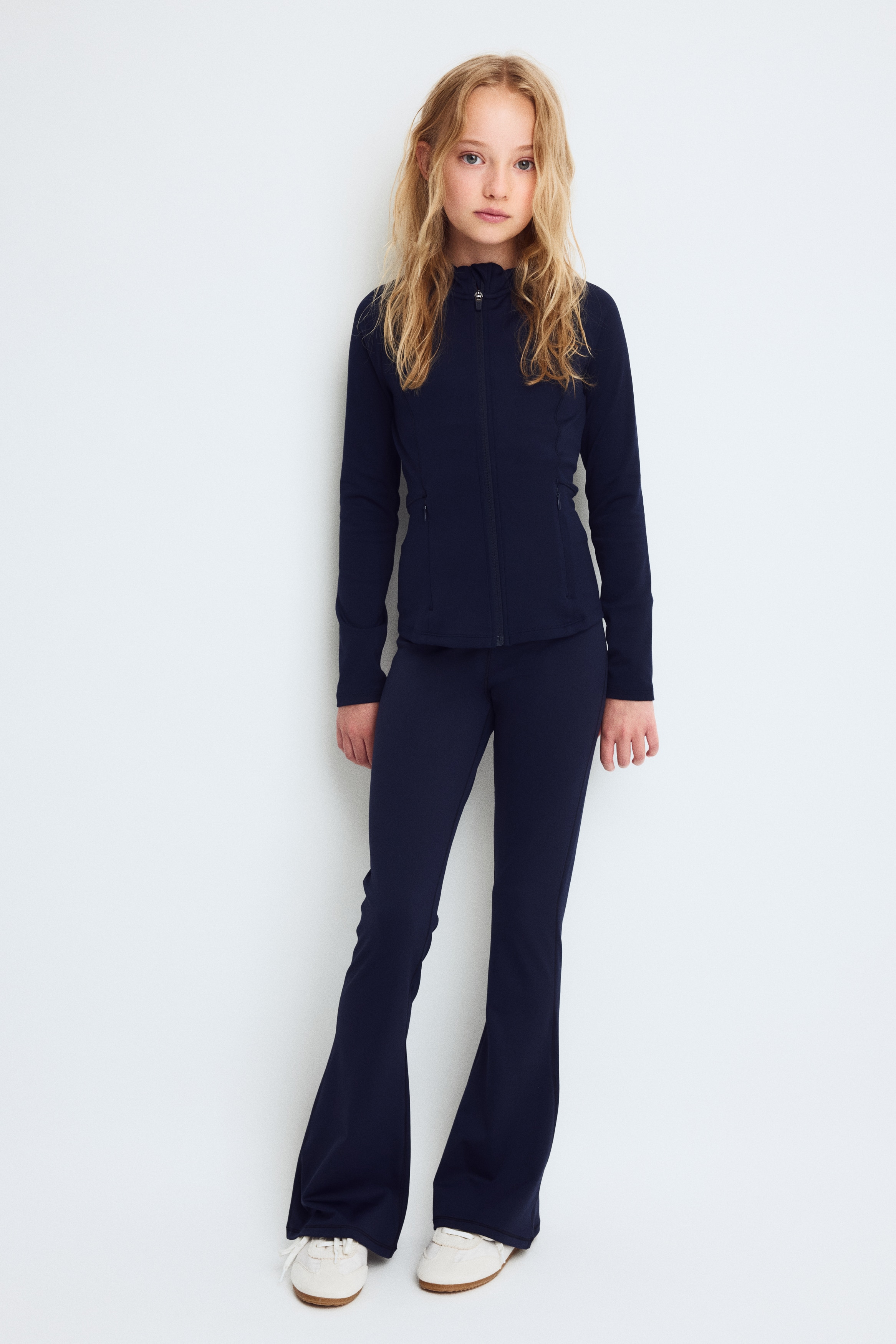 Flared sports leggings with DryMove™Model