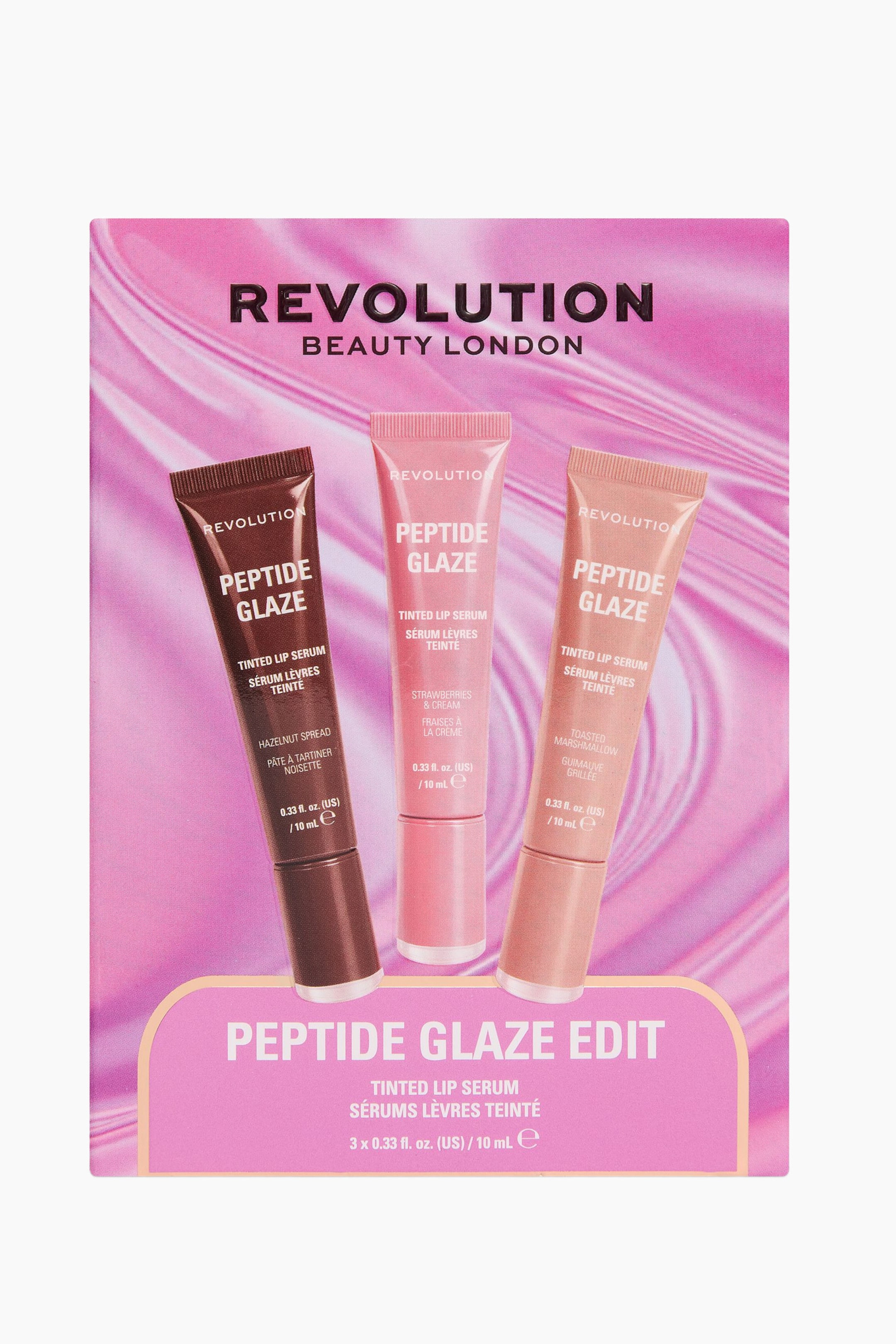 Visa större bild: En rosa, rektangulär presentask märkt "Peptide Glaze Edit" från Revolution visar tre tonade läppserum i klämförpackning placerade vertikalt mot en virvlande rosa bakgrund. Tuberna inkluderar en mörkbrun nyans till vänster, en klarrosa nyans i mitten och en ljus persiko-rosa nyans till höger, alla med vit text och glansig finish.