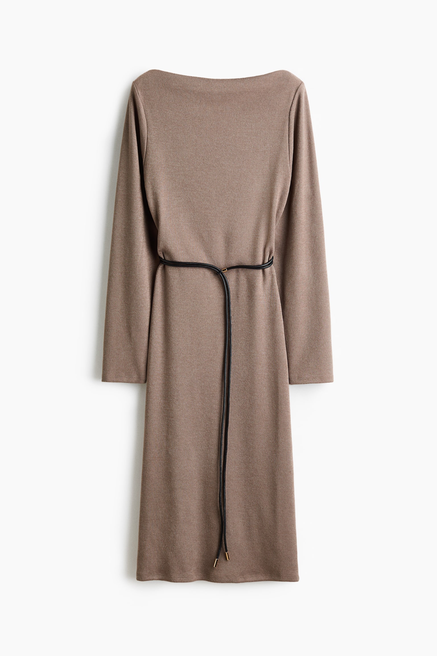 A long, loose-fit rib-knit dress in taupe is hanging front-facing, featuring a delicate boat neck and long sleeves. A thin black double-strap belt with gold metal tips cinches the waist, with its long ends draping down the front of the straight skirt.