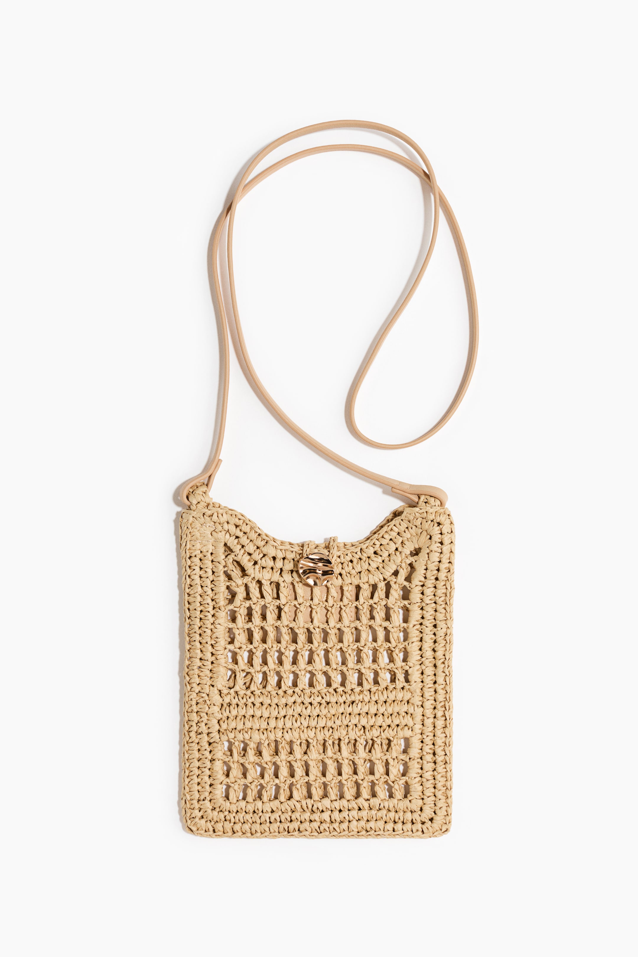 View larger image: A small, rectangular beige woven crossbody bag is presenting its front, featuring a crocheted raffia body. It is designed with a thin, light brown strap and a small, irregular gold-toned metallic clasp at the center top.