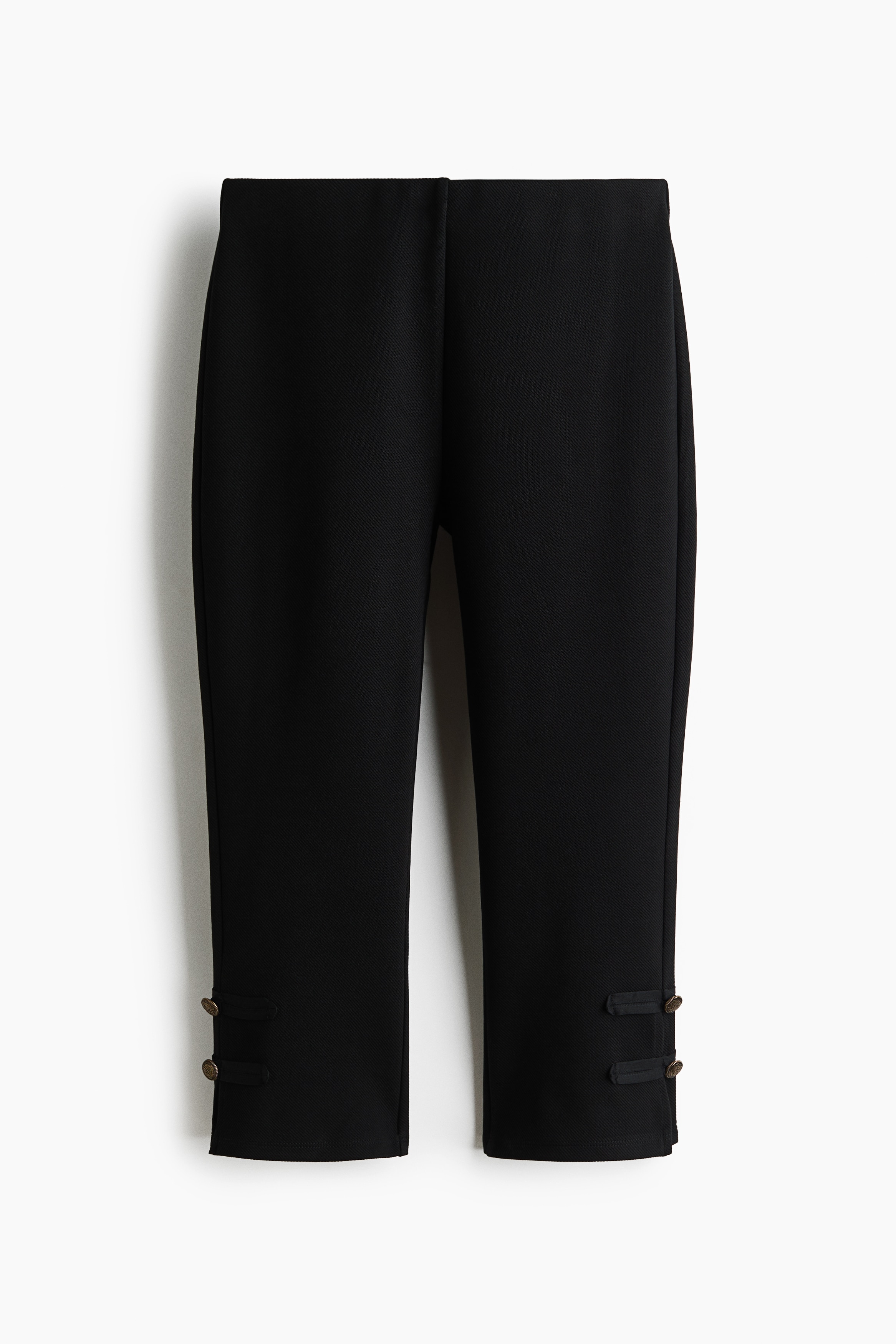 Pantaloni capri con bottone decorativo - Nero