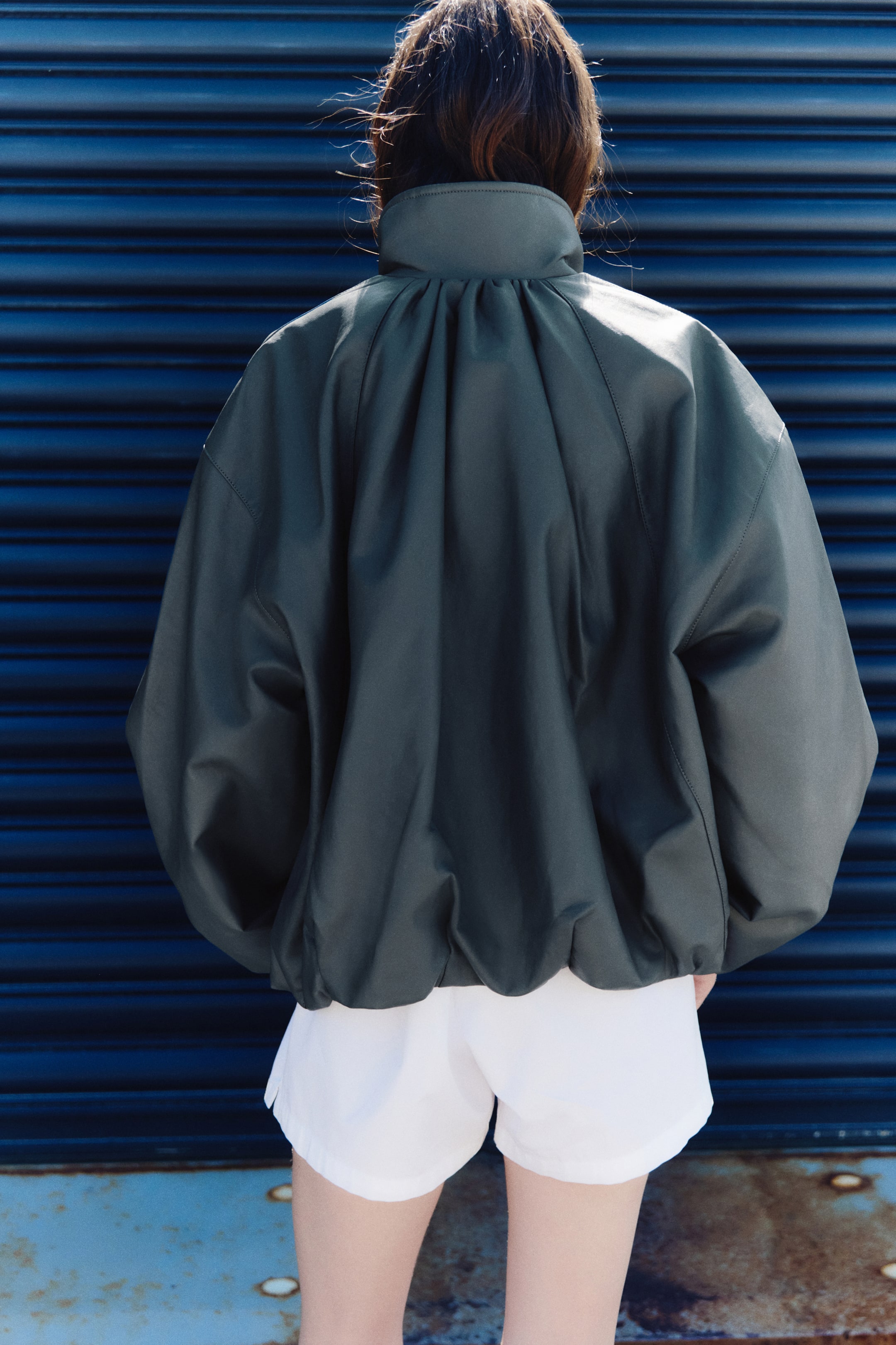 Veste à manches ballon en tissu enduit