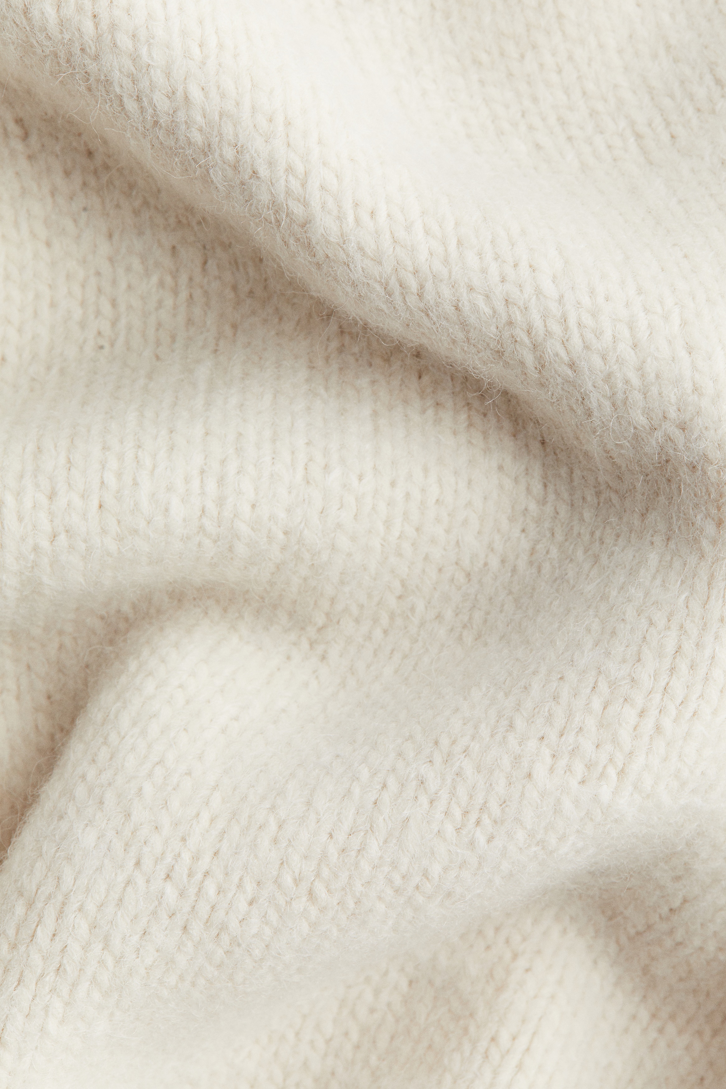 Loose-fit polo-neck jumper