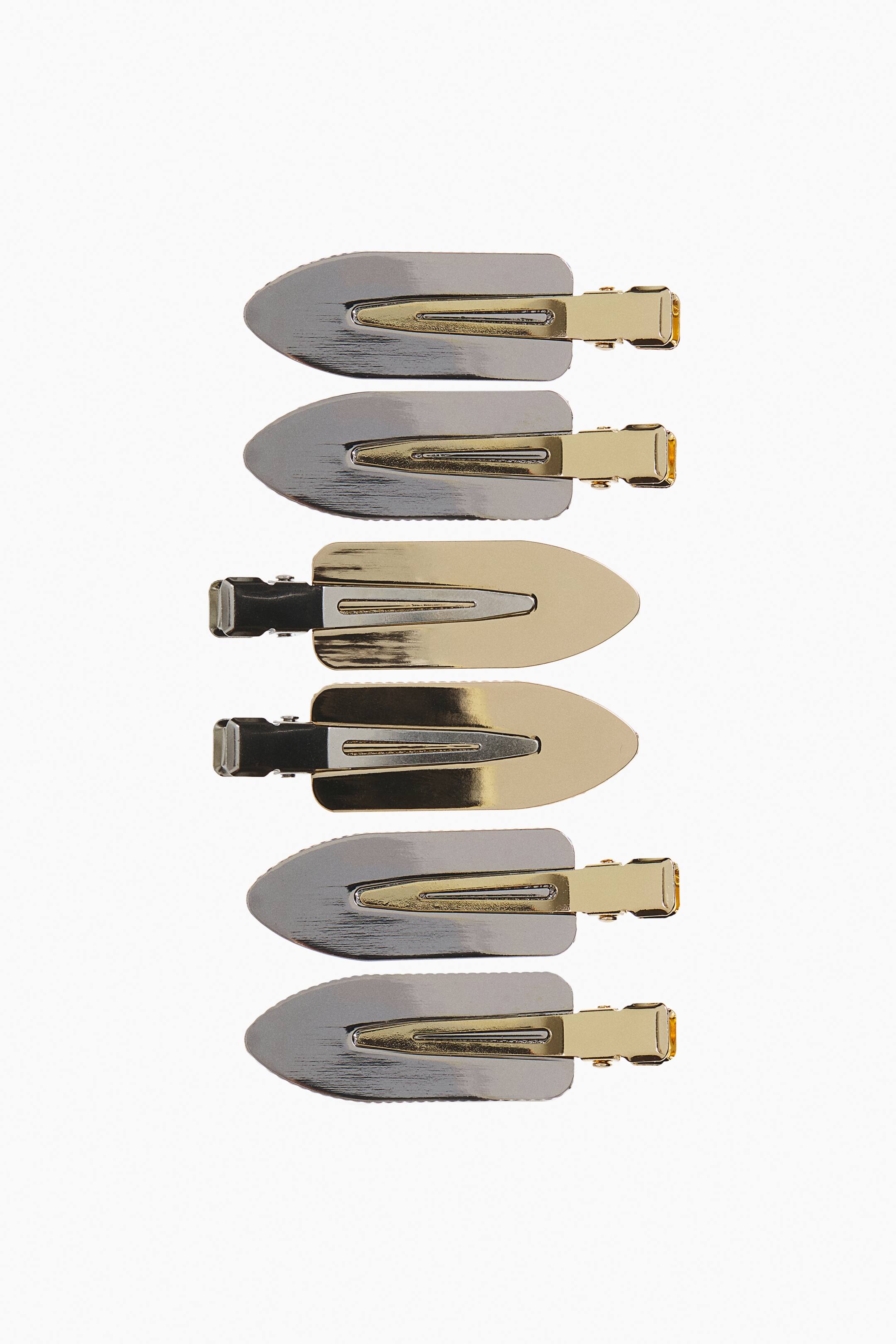Visualizza immagine più grande: Sei fermagli per capelli senza pieghe sono disposti verticalmente, con quattro palette a forma di foglia in tonalità argento con fermagli metallici color oro e due palette a forma di foglia in tonalità oro con fermagli metallici color argento.