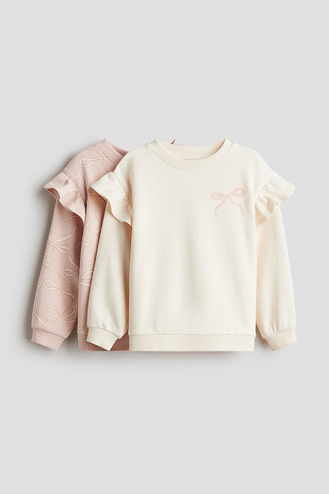 2er-Pack Sweatshirts mit Volants - Hellrosa/Schleifen/Hellrosa/Häschen - 1