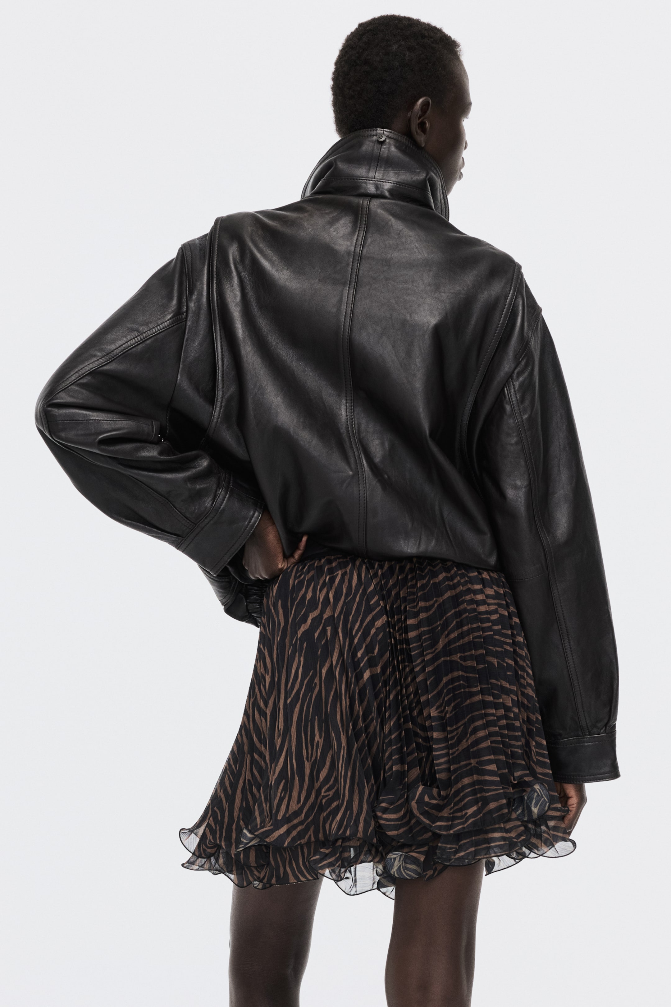 View larger image: Pleated mini skirt - Black/Zebra print - Ladies | H&M 4
