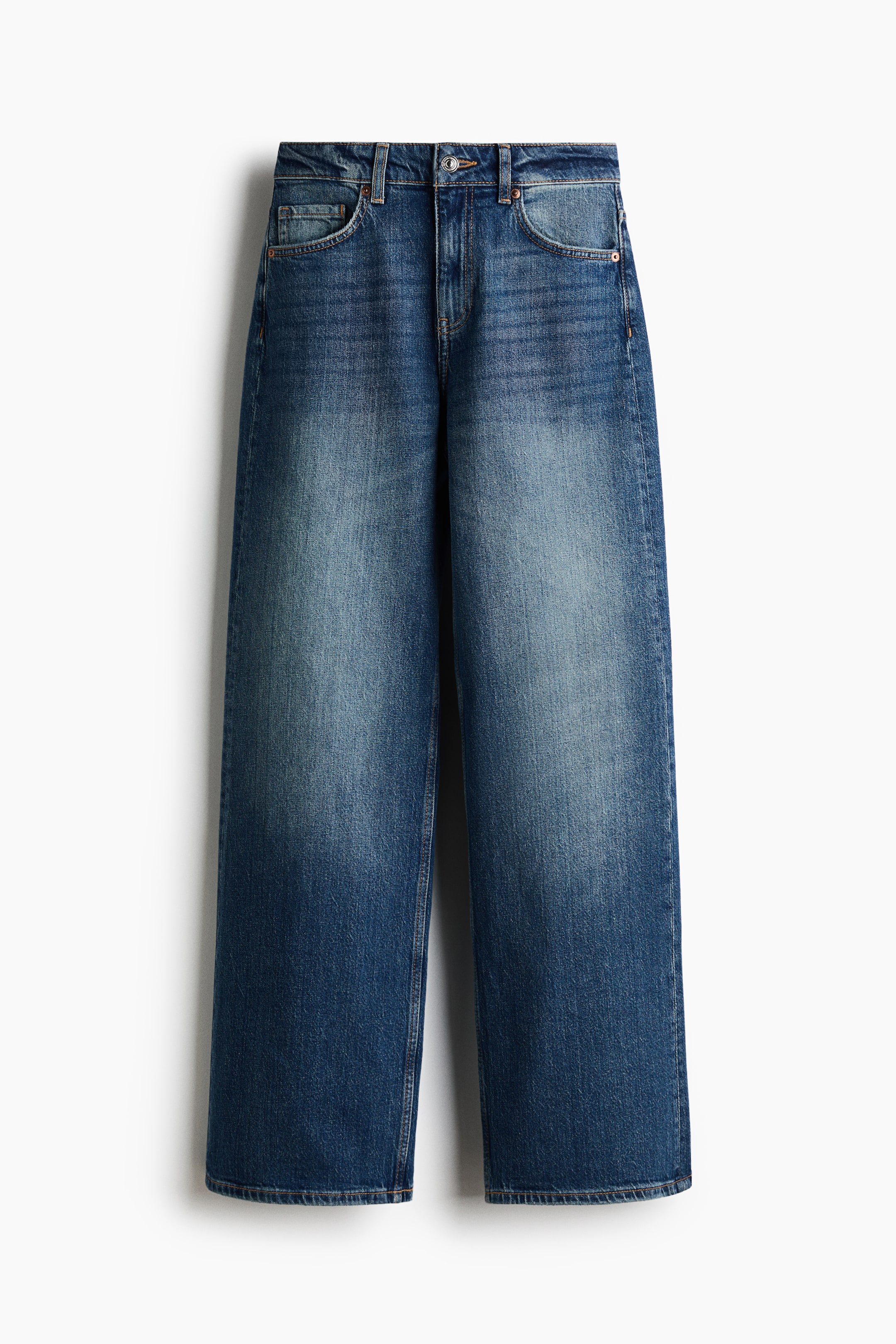 View larger image: Blue denim wide-leg jeans are hanging, facing forward. They display a faded wash with lighter areas on the thighs, a five-pocket design, belt loops, and a button closure.